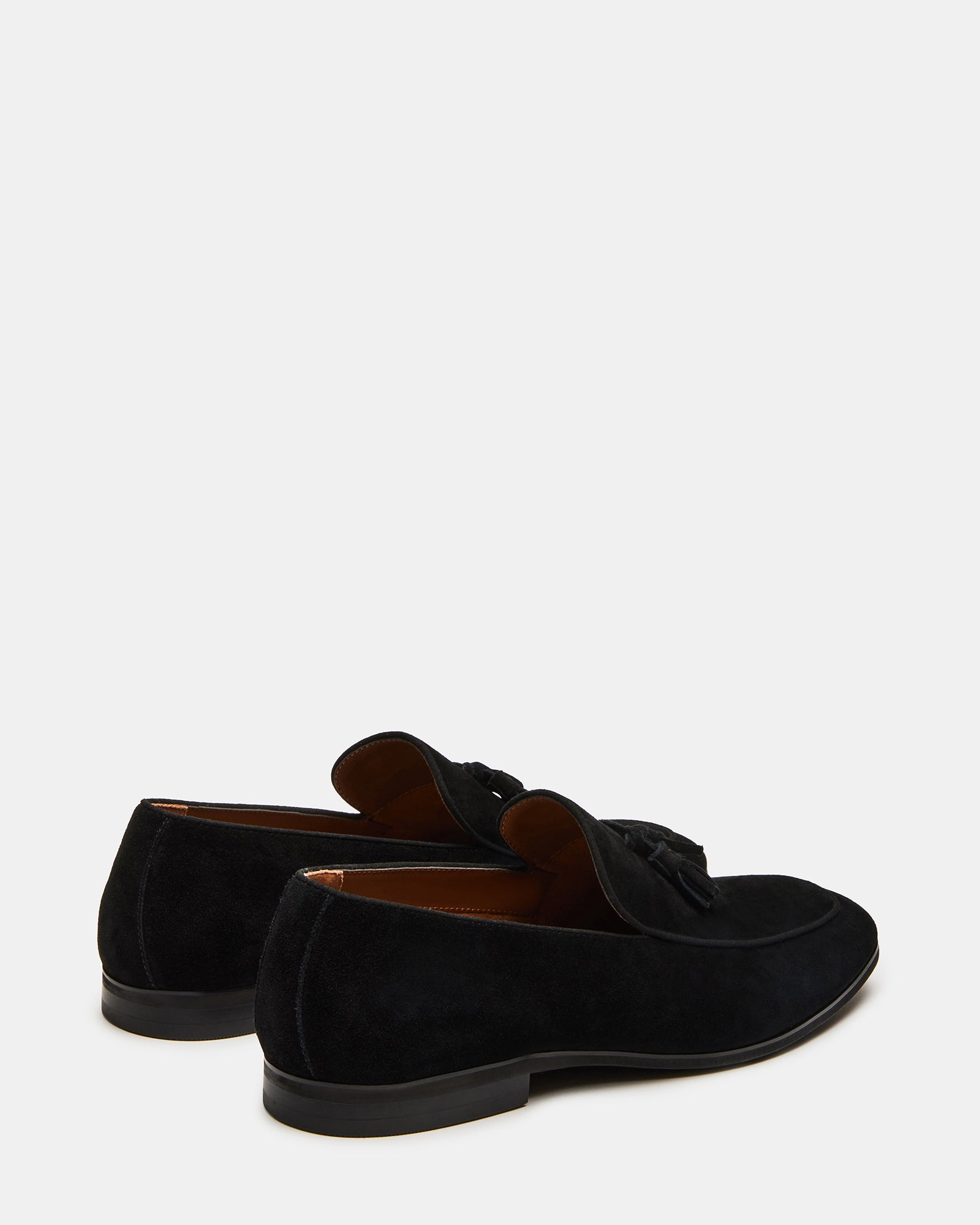 Top-down shot of mens black suede loafers highlighting slip-on style and elegant design