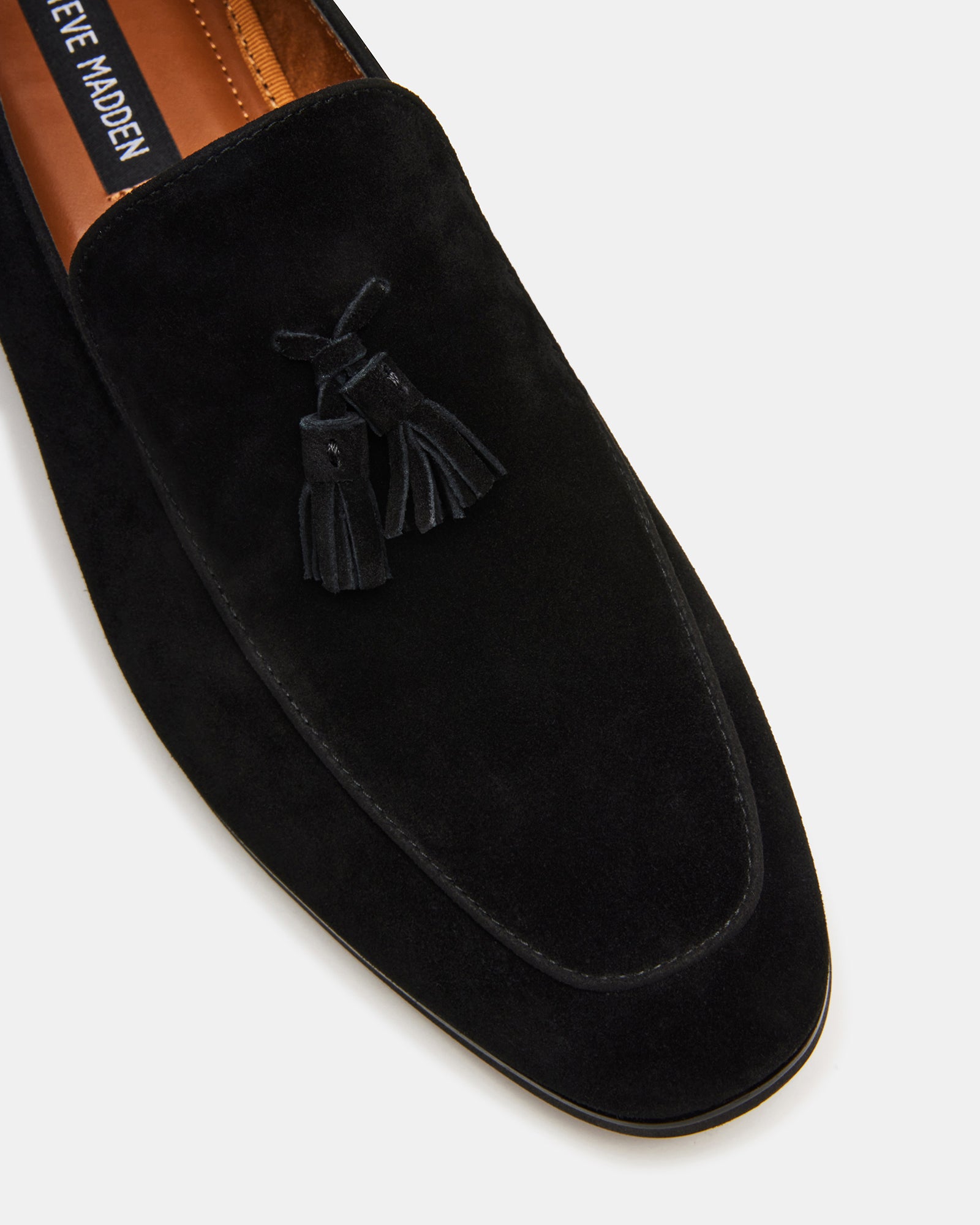 Fashionable men wearing black suede loafers for business casual looks