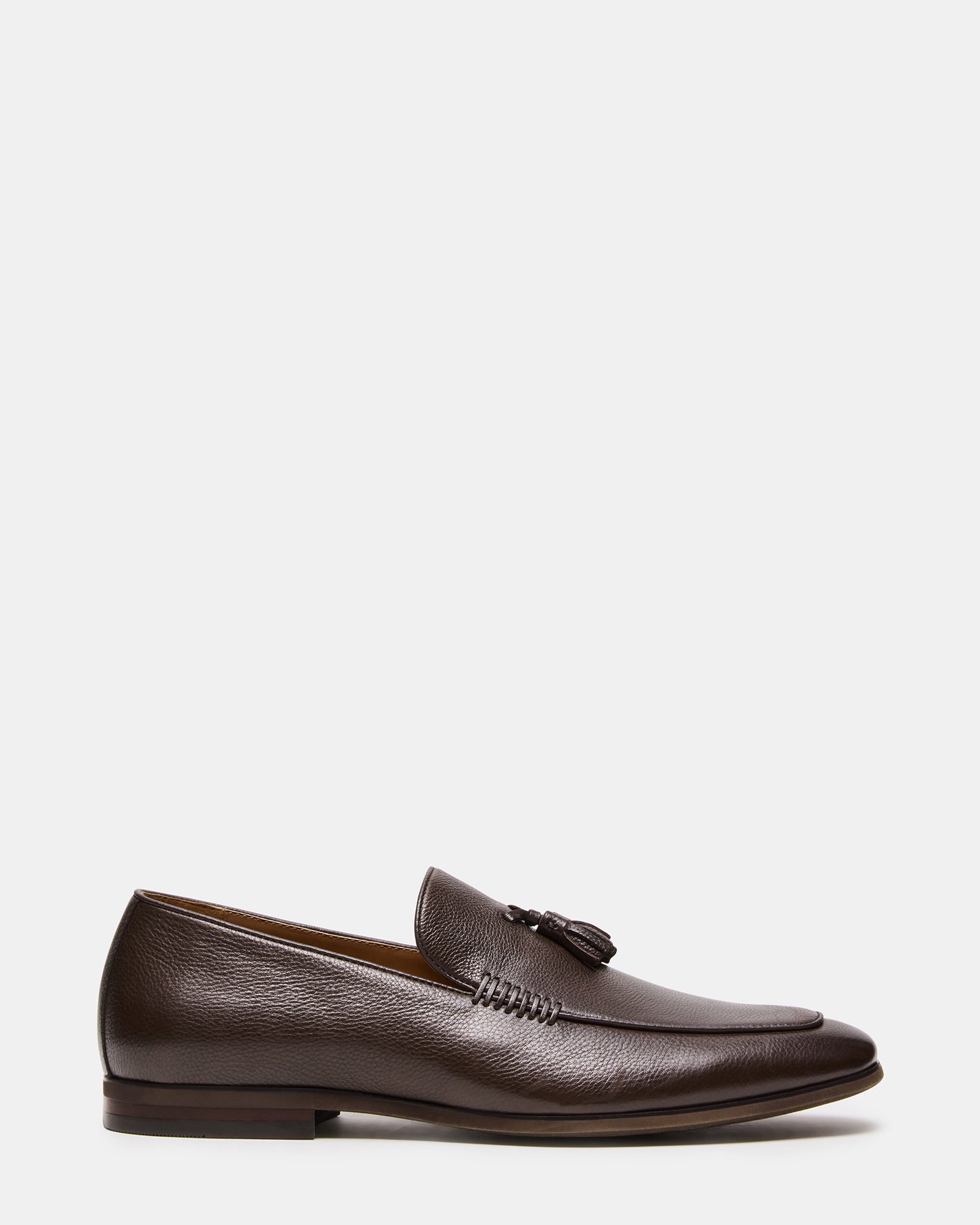 Close-up of ONDRE luxury leather loafers showcasing the tassel detail.