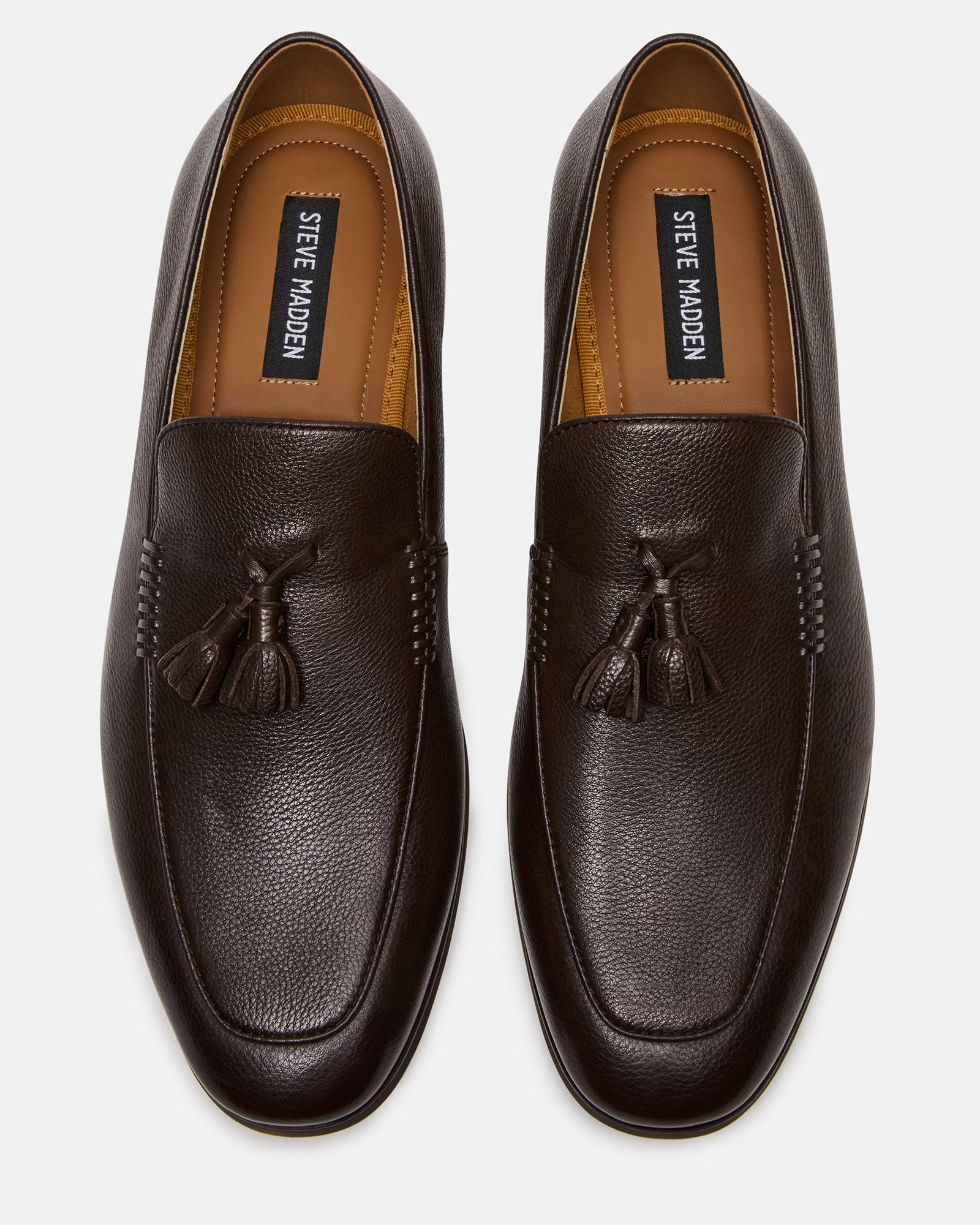 Stylish ONDRE brown leather loafers paired with business casual attire.