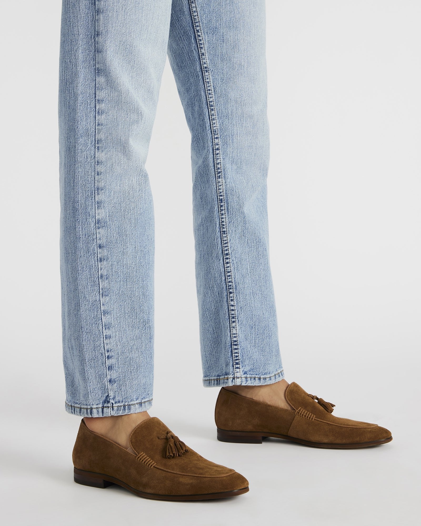 Side view of ONDRE loafers highlighting premium suede texture