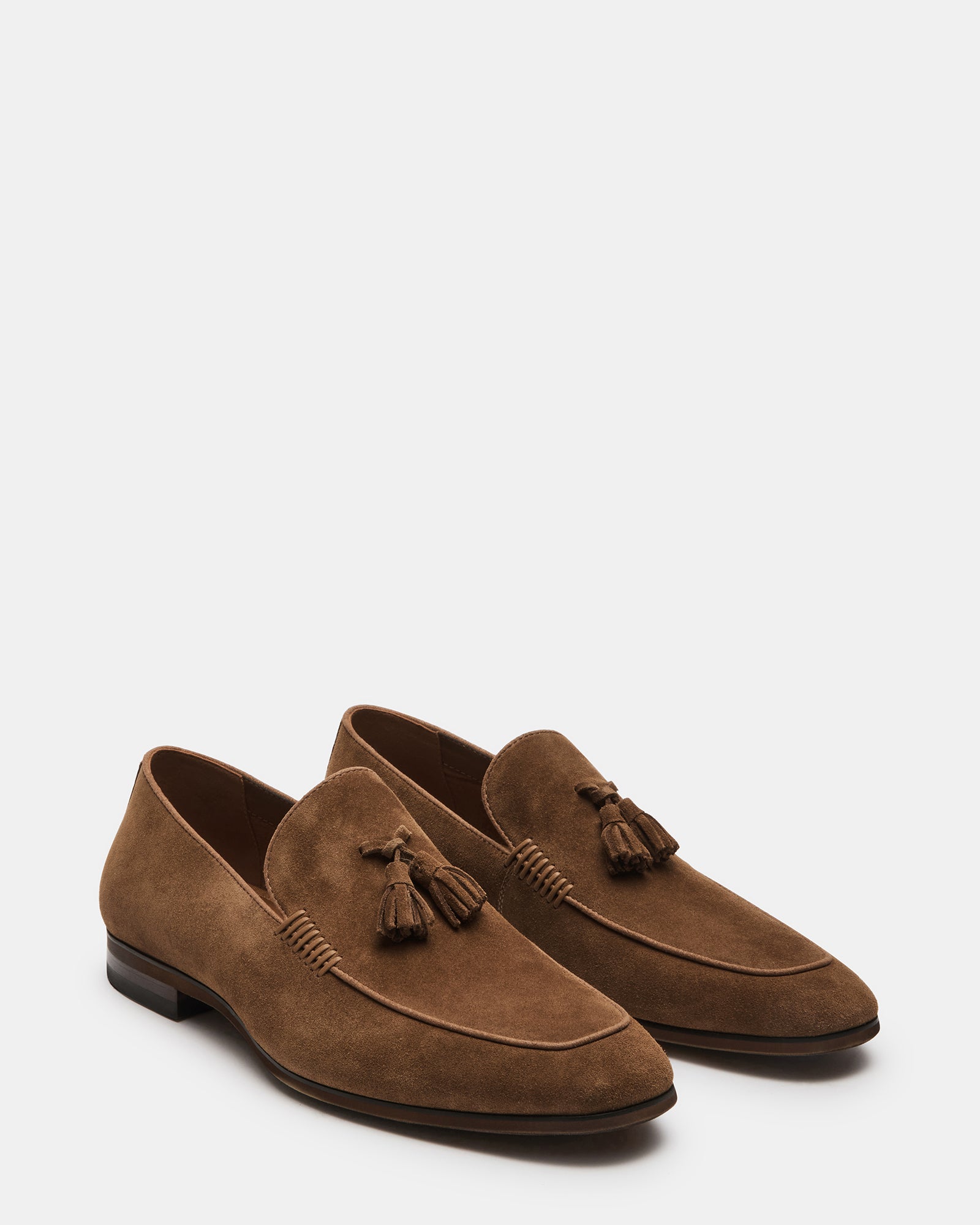 Loafers paired with tailored pants for a business-casual ensemble