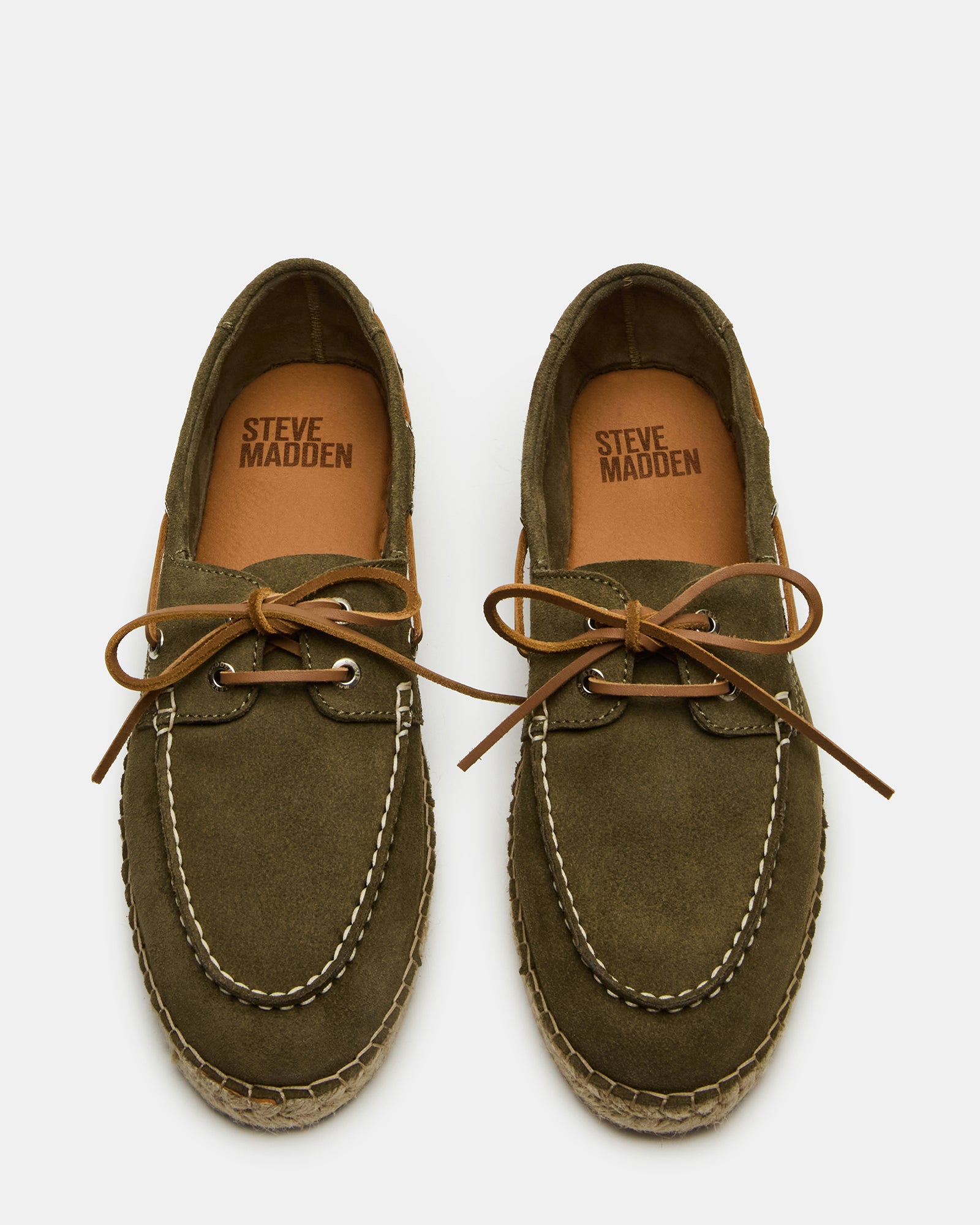 Side view of Pancho Olive Suede Slip-Ons highlighting the boat shoe design.