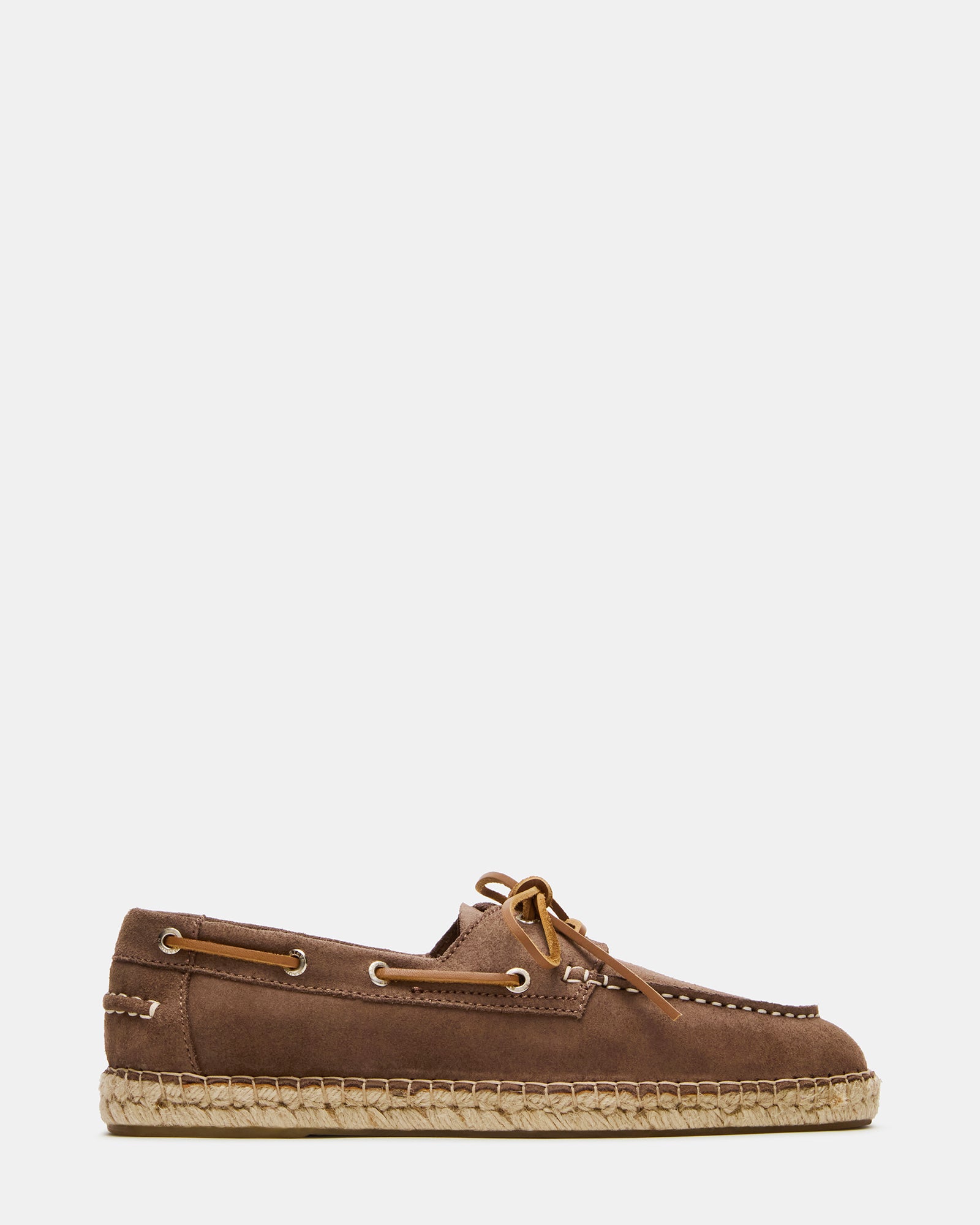 Side view of Pancho taupe suede slip-ons on a wooden deck, ideal for summer outings.