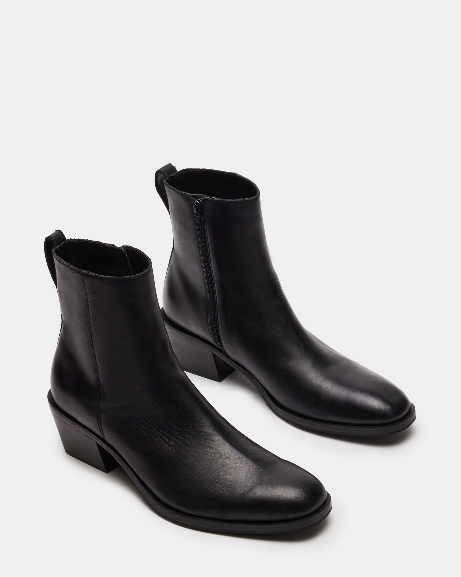 Side view of Richie ankle boots featuring zipper closure.