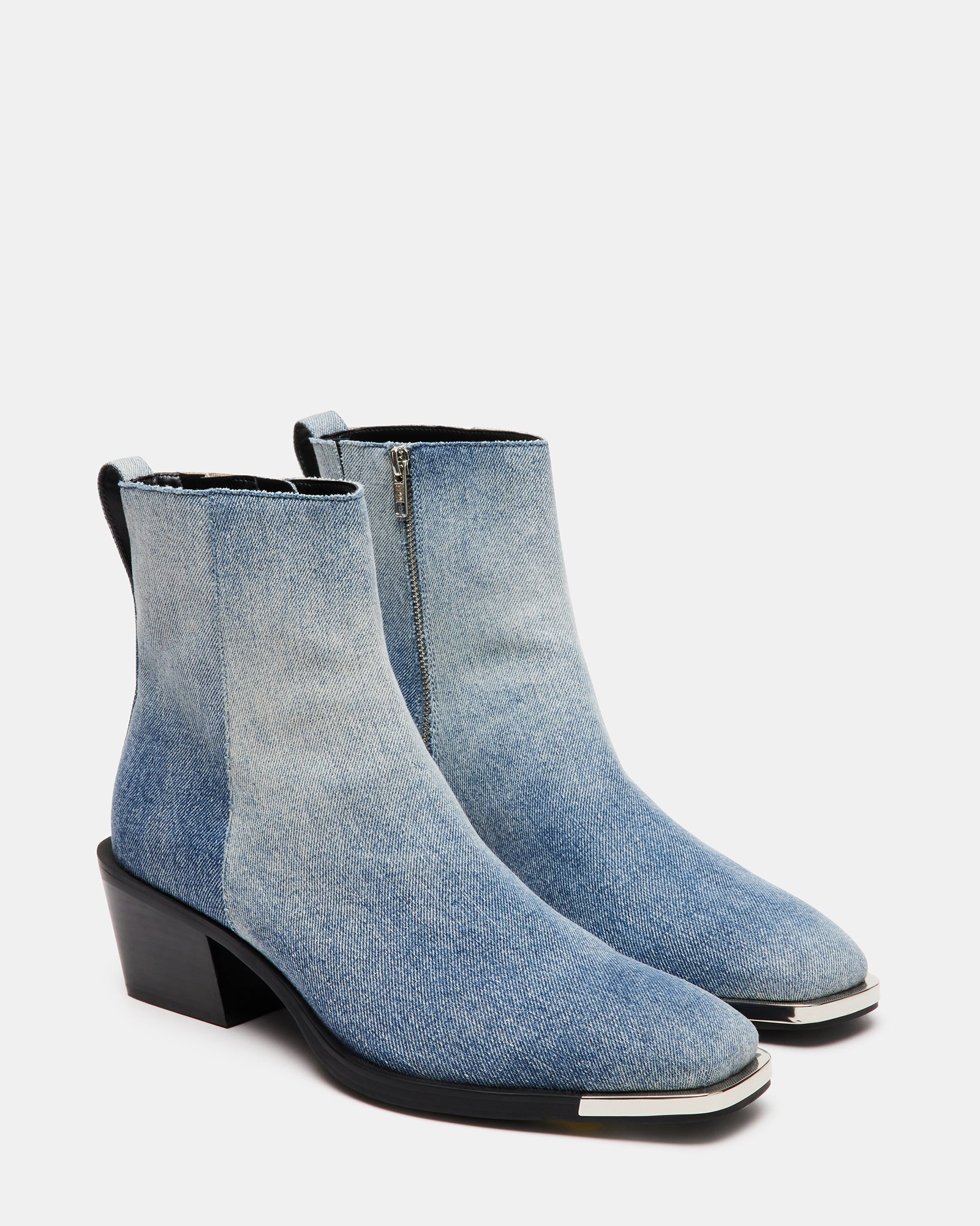 Close-up of the block heel and western stitching details