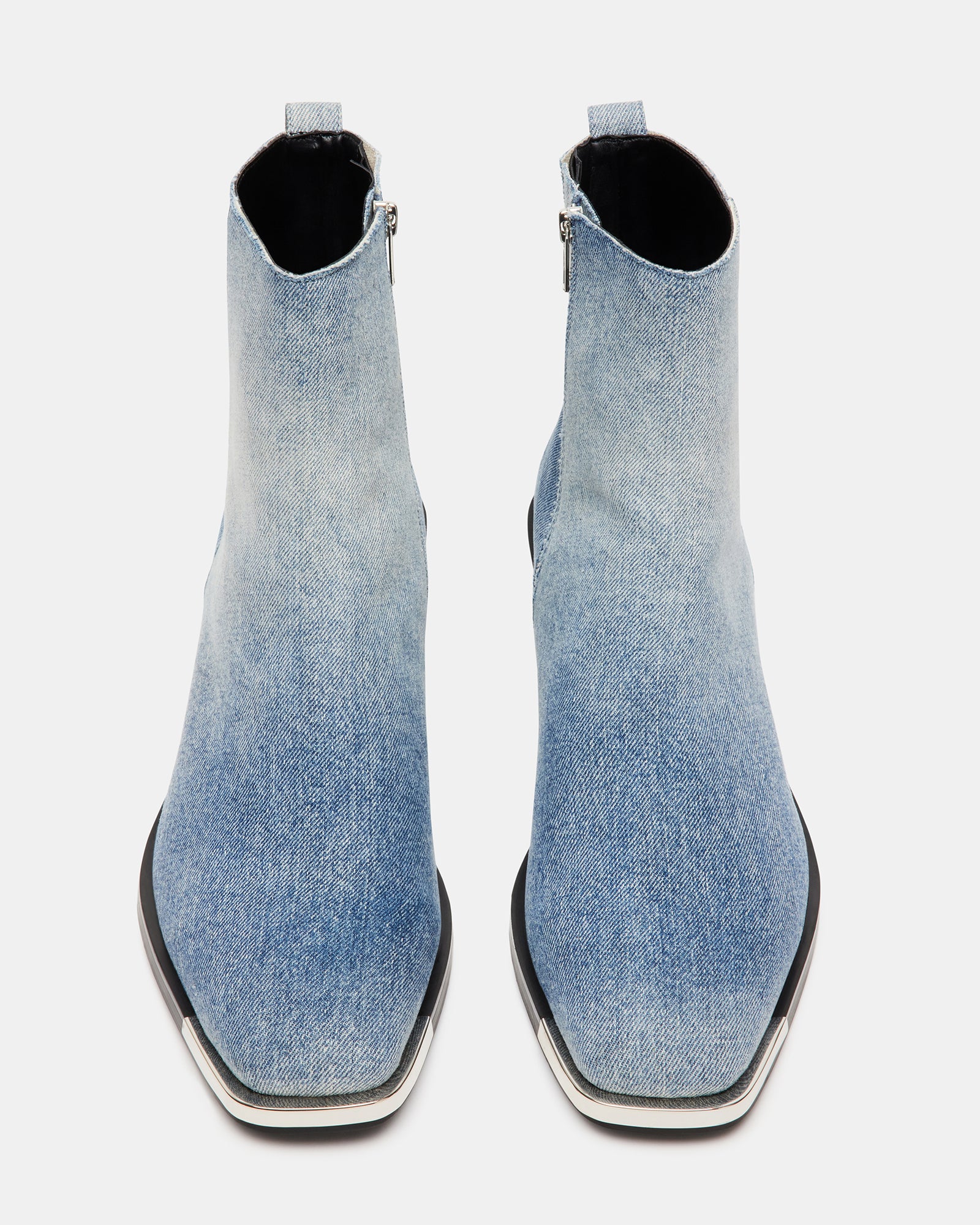 Side view showcasing the zipper closure and tapered toe