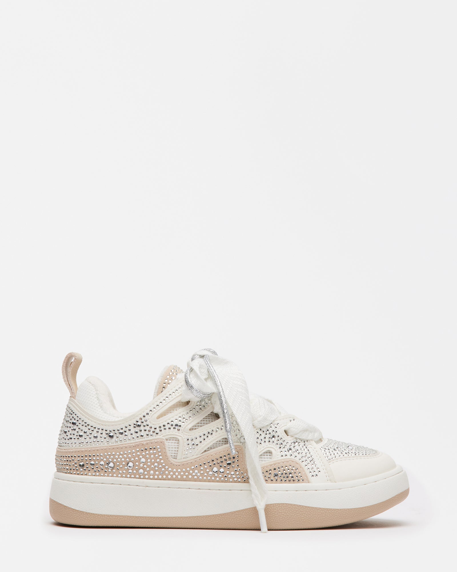 Close-up side view showing rhinestone pattern and double lacing on white platform sneakers