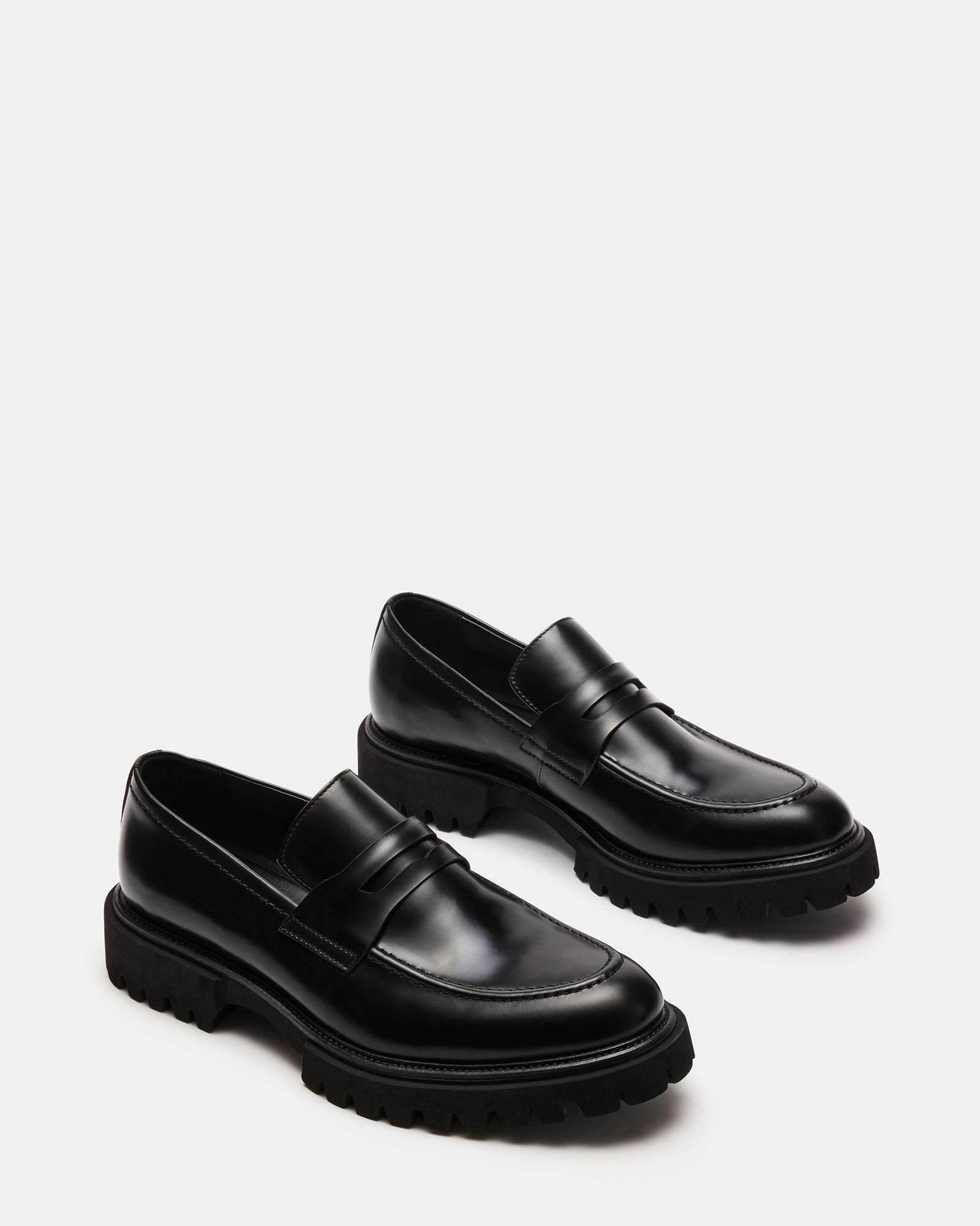 Ronen loafers being worn with business casual outfit