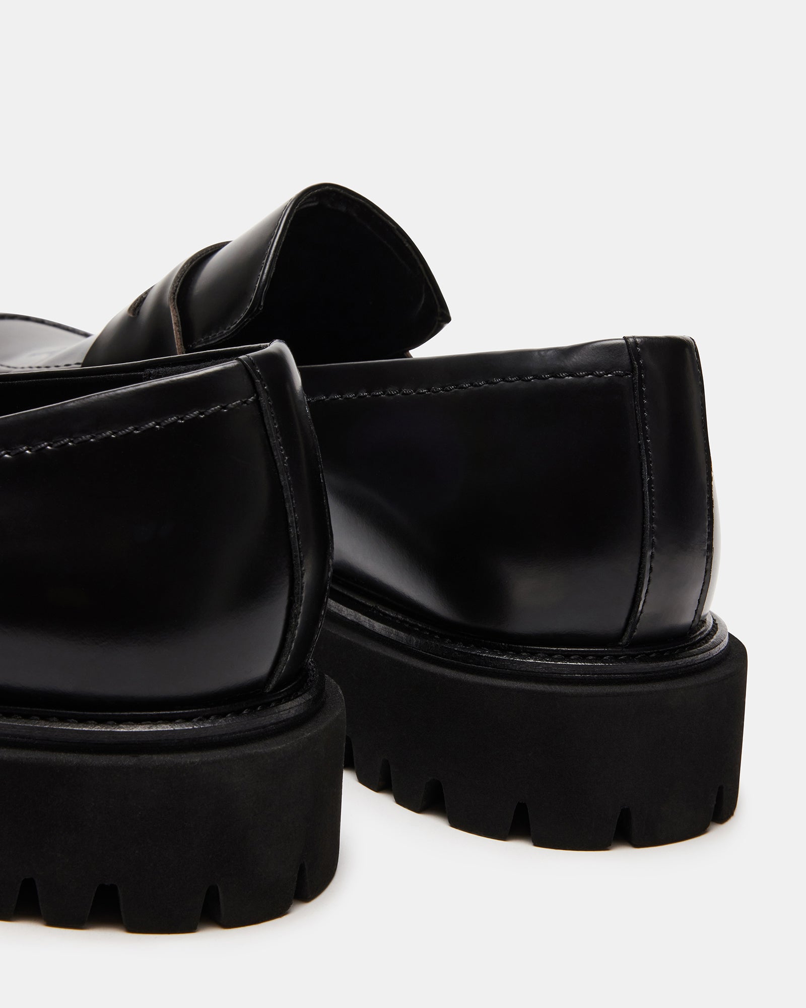Close-up of loafers textured rubber sole for traction