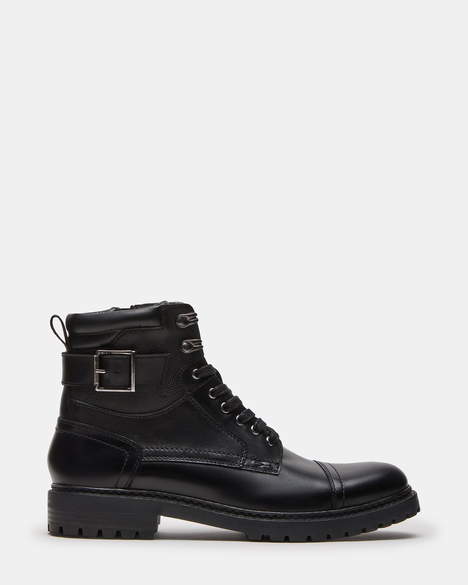 Side profile of black ankle boots with buckle and lace details, styled for fall fashion