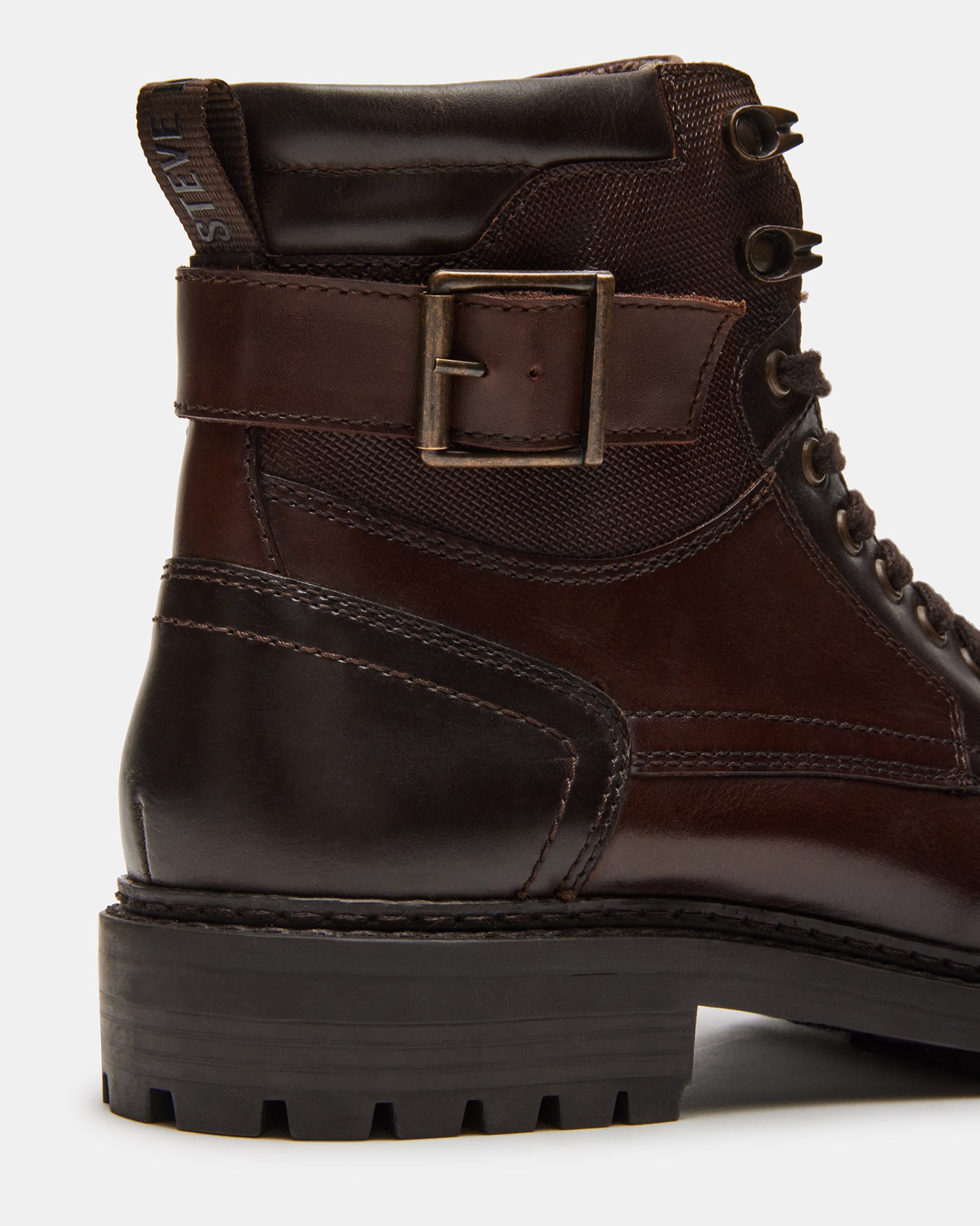 Lifestyle shot of black ankle boots paired with jeans during autumn in Massachusetts