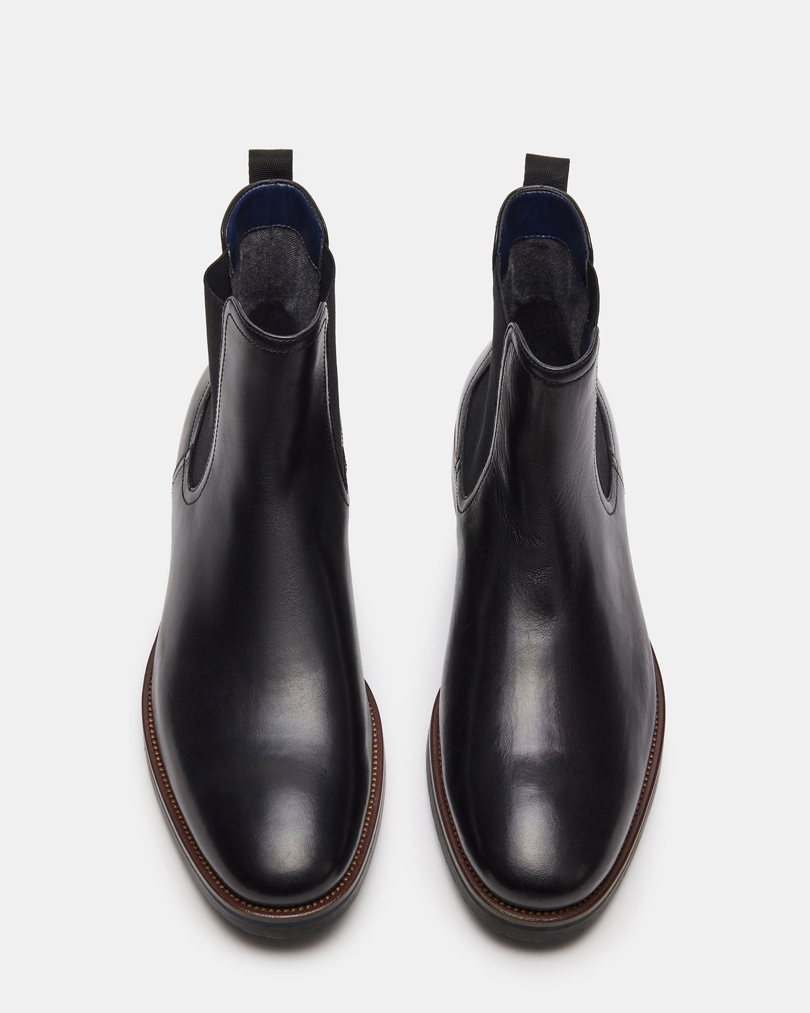Rear view highlighting pull tab and heel detail on men boots leather black