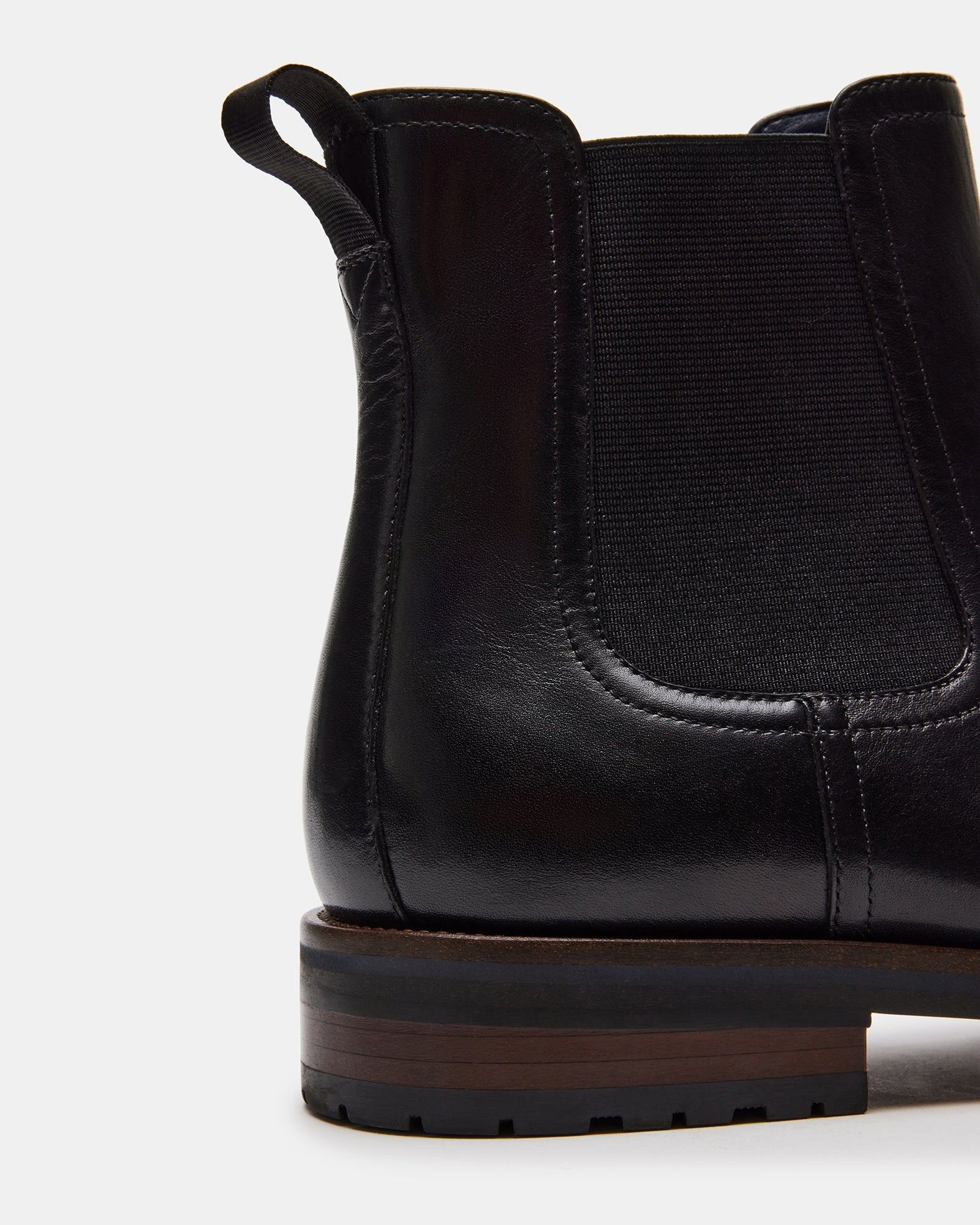 Front angle showing SYRE fashion boots styled with jeans