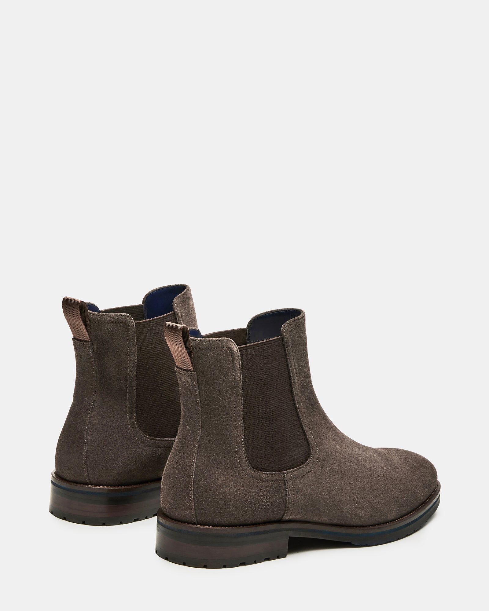 Lifestyle shot of women’s boots worn during fall stroll in Rochester park