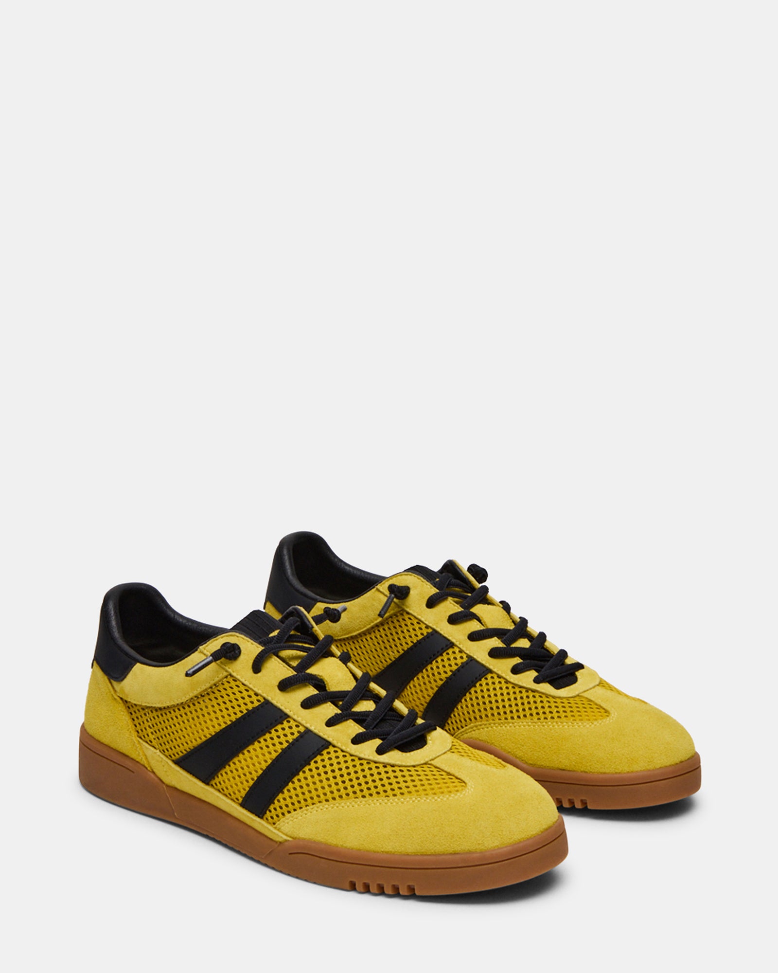 Close-up of the textile and suede material on VIENTO sneakers.