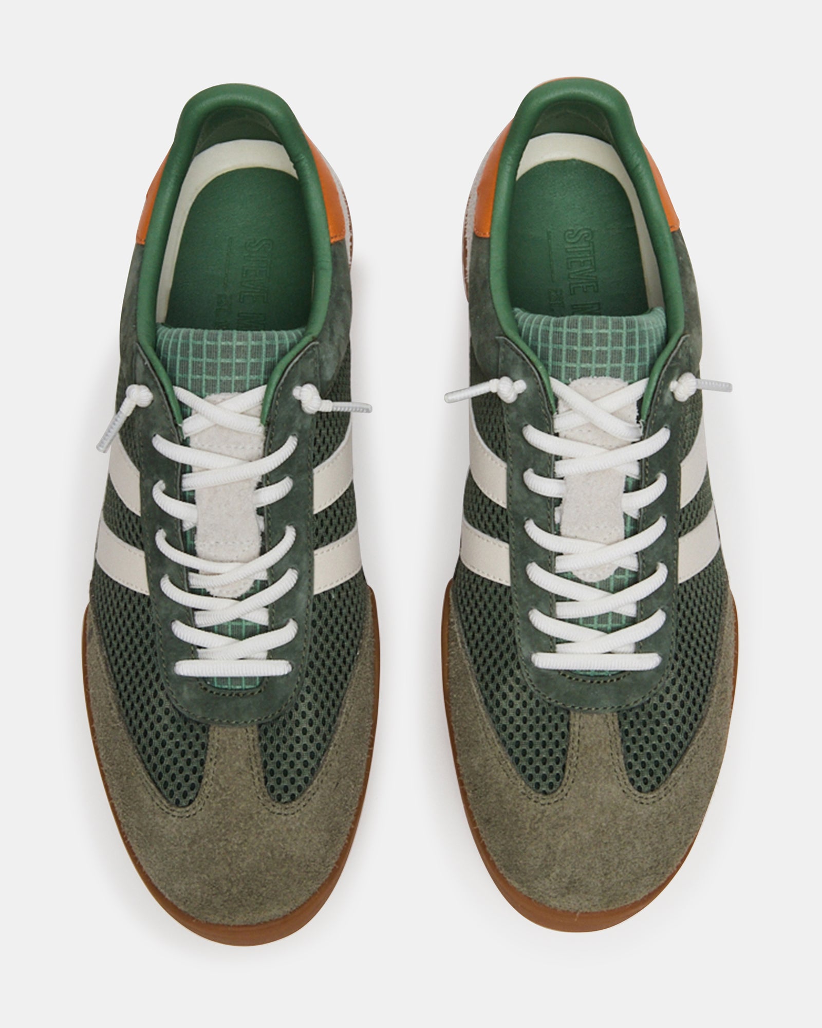 Side view of VIENTO sneakers demonstrating the sleek design suitable for everyday wear.
