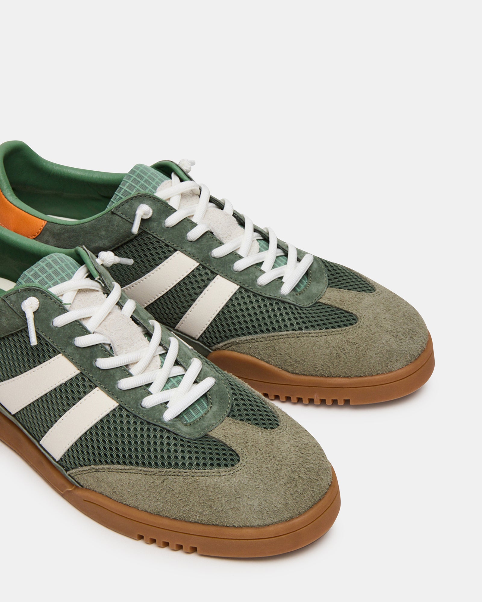 Close-up of VIENTO Green Multi lace-up sneakers showcasing the suede and textile textures.