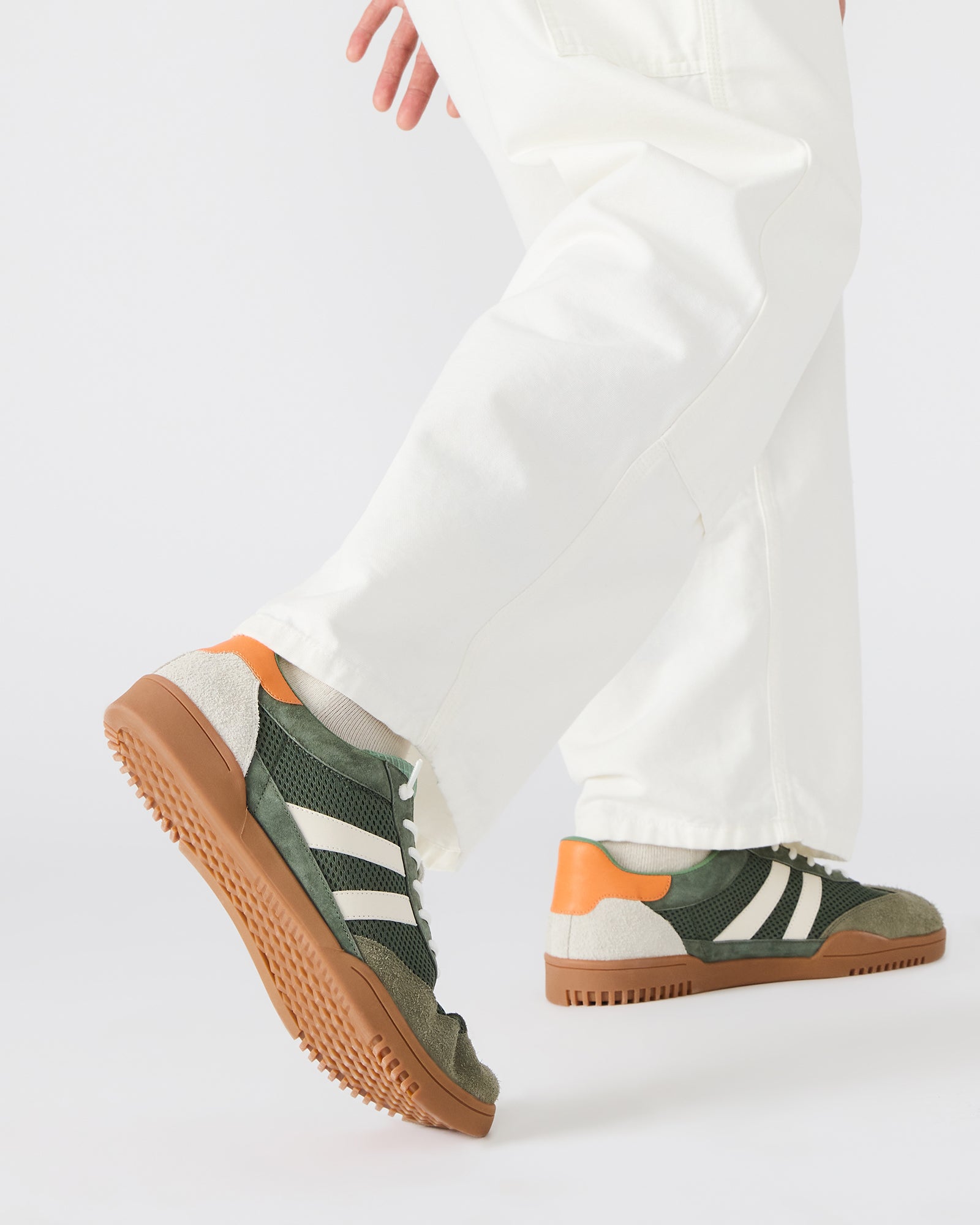 Side view of VIENTO sneakers demonstrating the sleek design suitable for everyday wear.