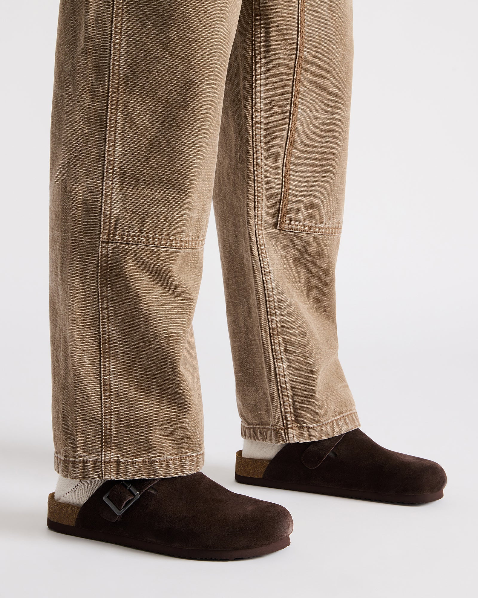 Close-up of the adjustable buckle on Wilderr mens slip-on loafers in rich suede