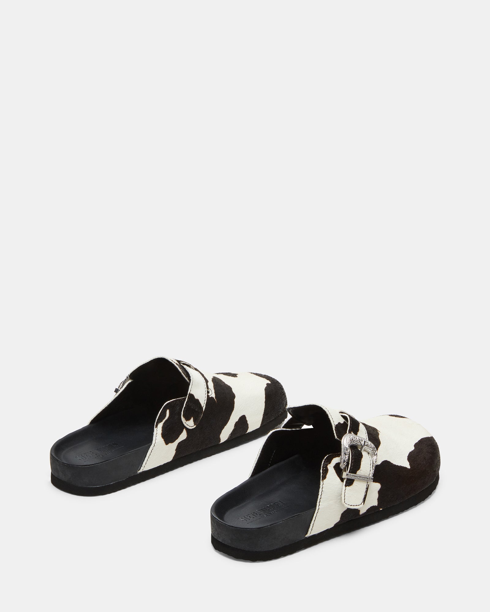 Close-up of the shoes supportive footbed and synthetic sole for comfort