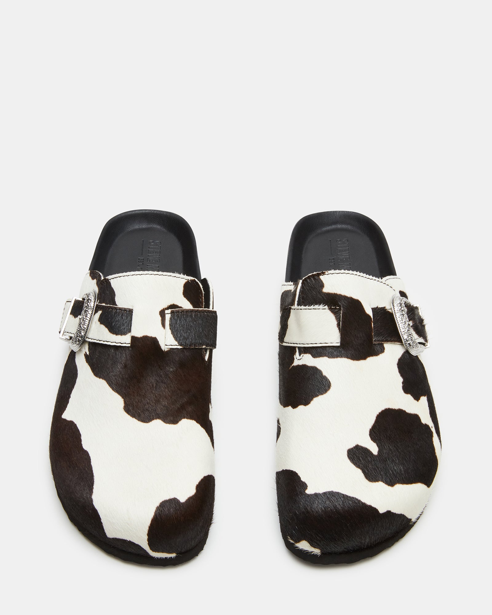 Side view of the WOOLY Black Multi mens slip-on shoes highlighting the leather upper