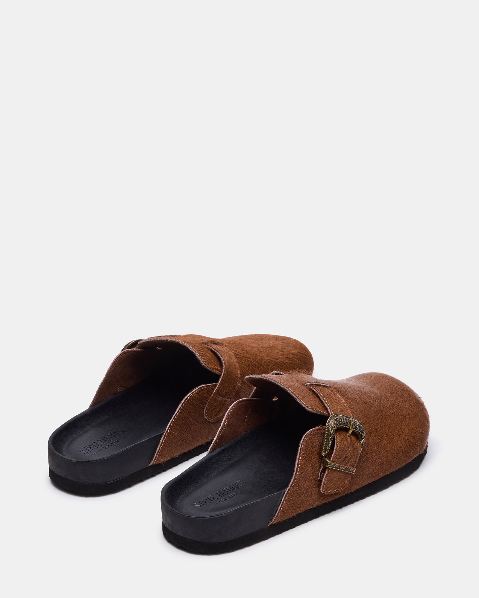 Side profile of casual slip-on shoes styled for comfort and charm