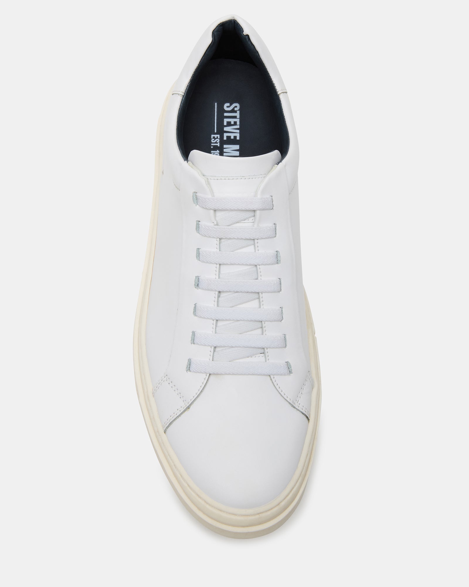 Close-up of the lace-up closure on ZOII white sneakers for everyday style