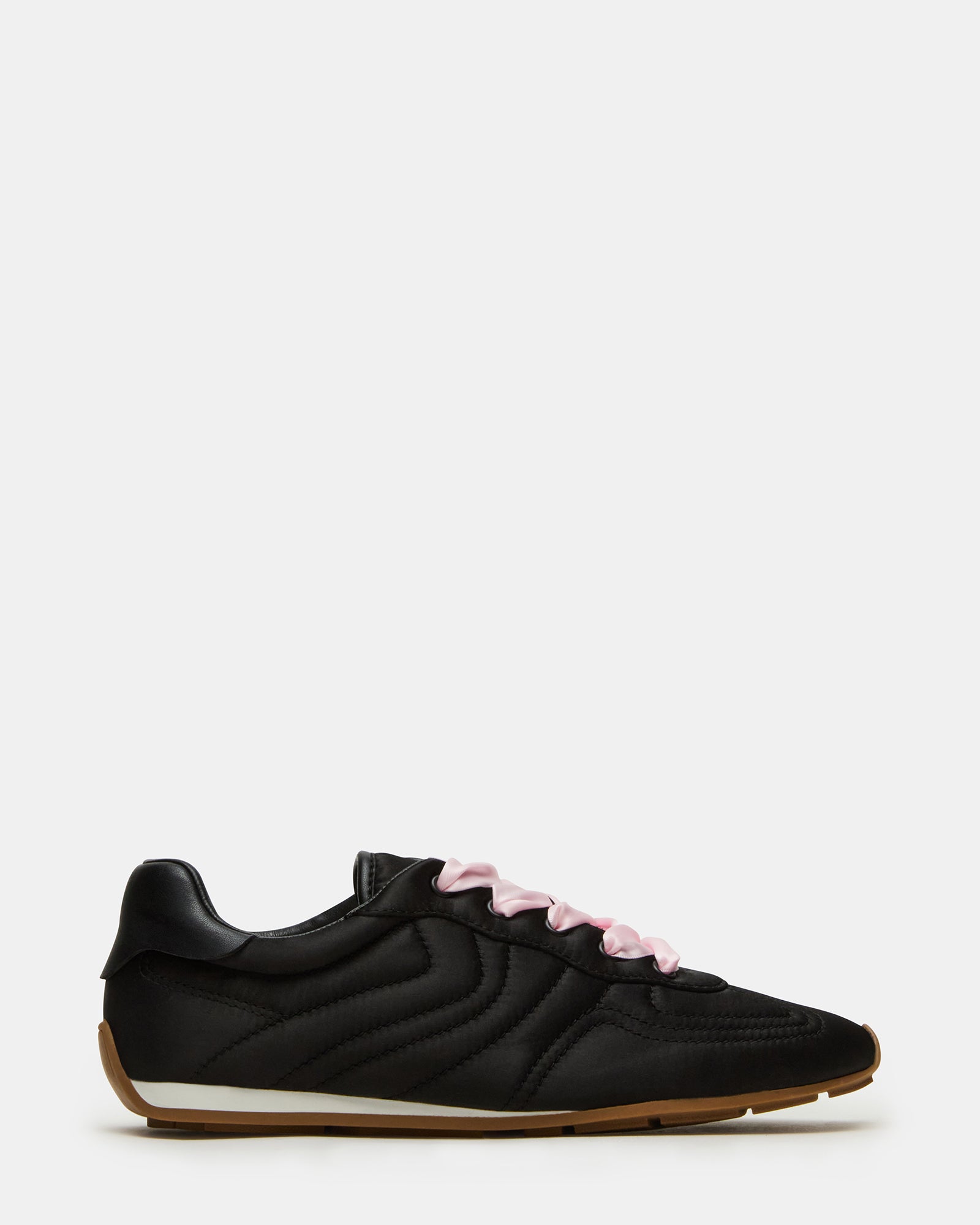 ABBI black satin sneakers from a side angle, showcasing the sleek texture and lace-up design