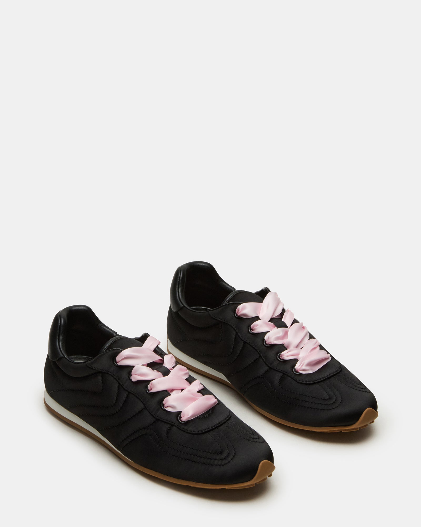 Close-up of the satin upper material and stitching detail on these mens casual shoes
