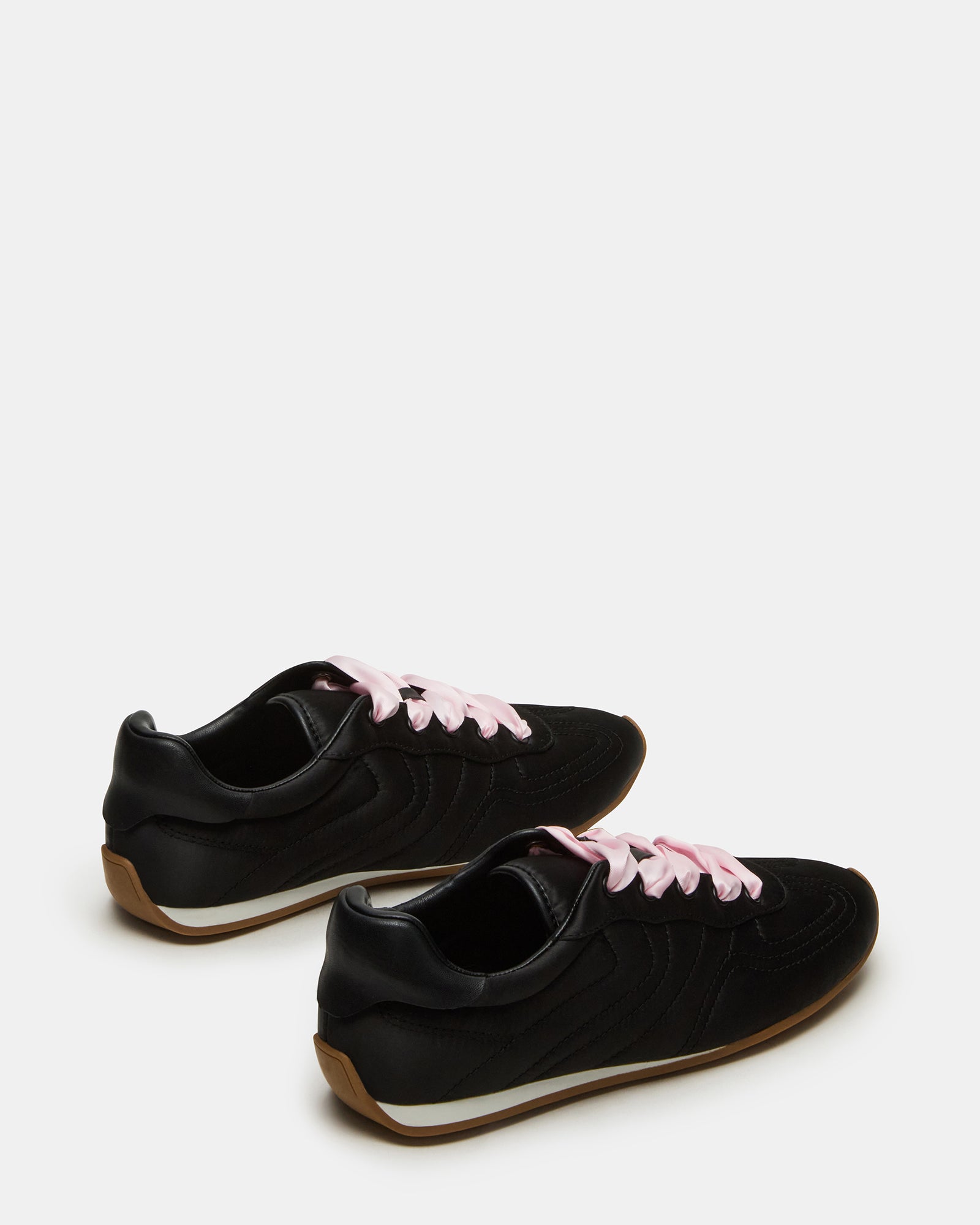 Close-up of the satin upper material and stitching detail on these mens casual shoes