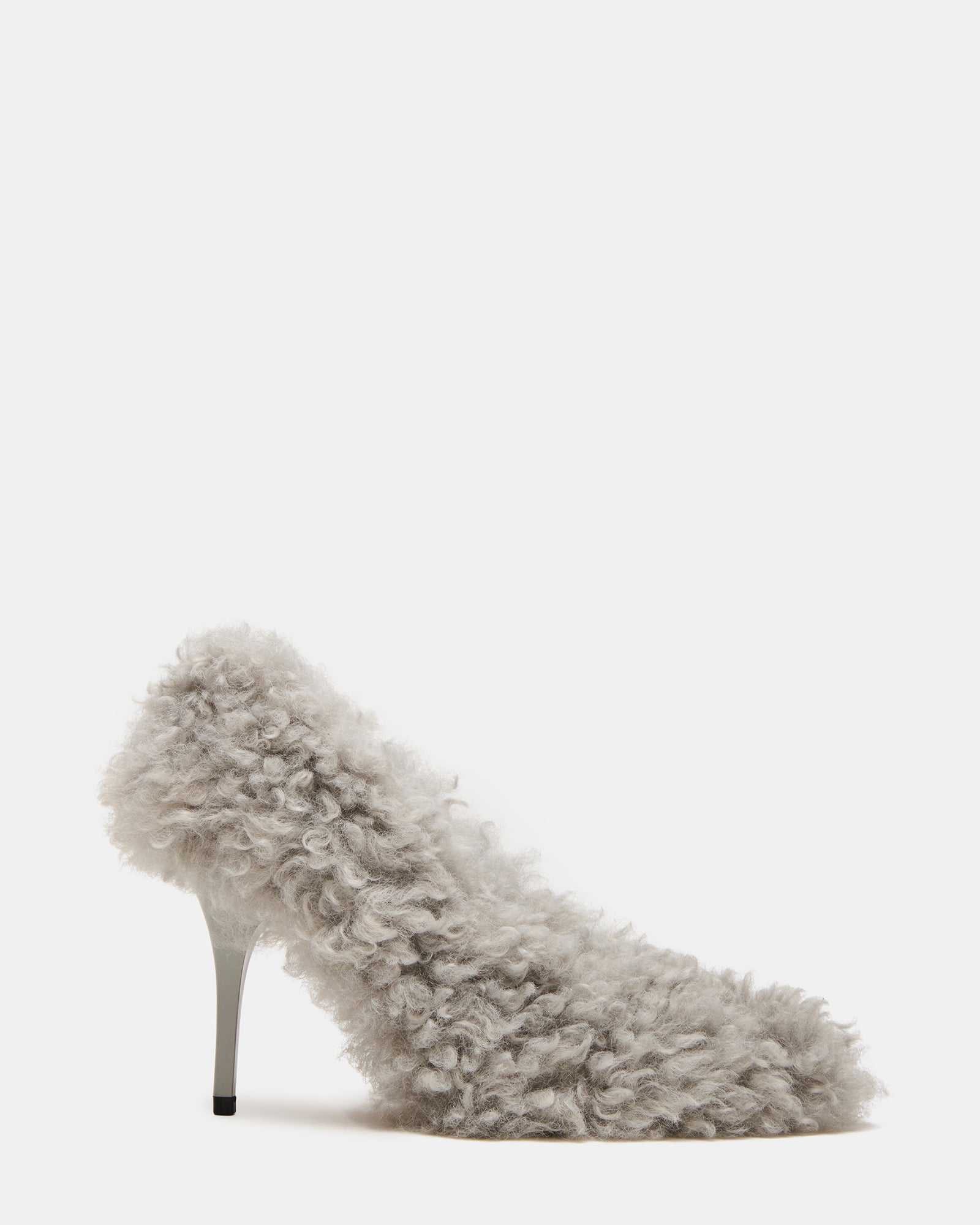 Close-up of faux fur shoes with pointed toe and stiletto heel in light blue finish