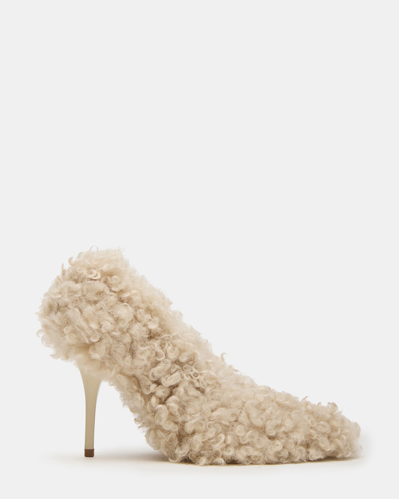 Side view of pointed toe pumps white with faux fur and stiletto heels