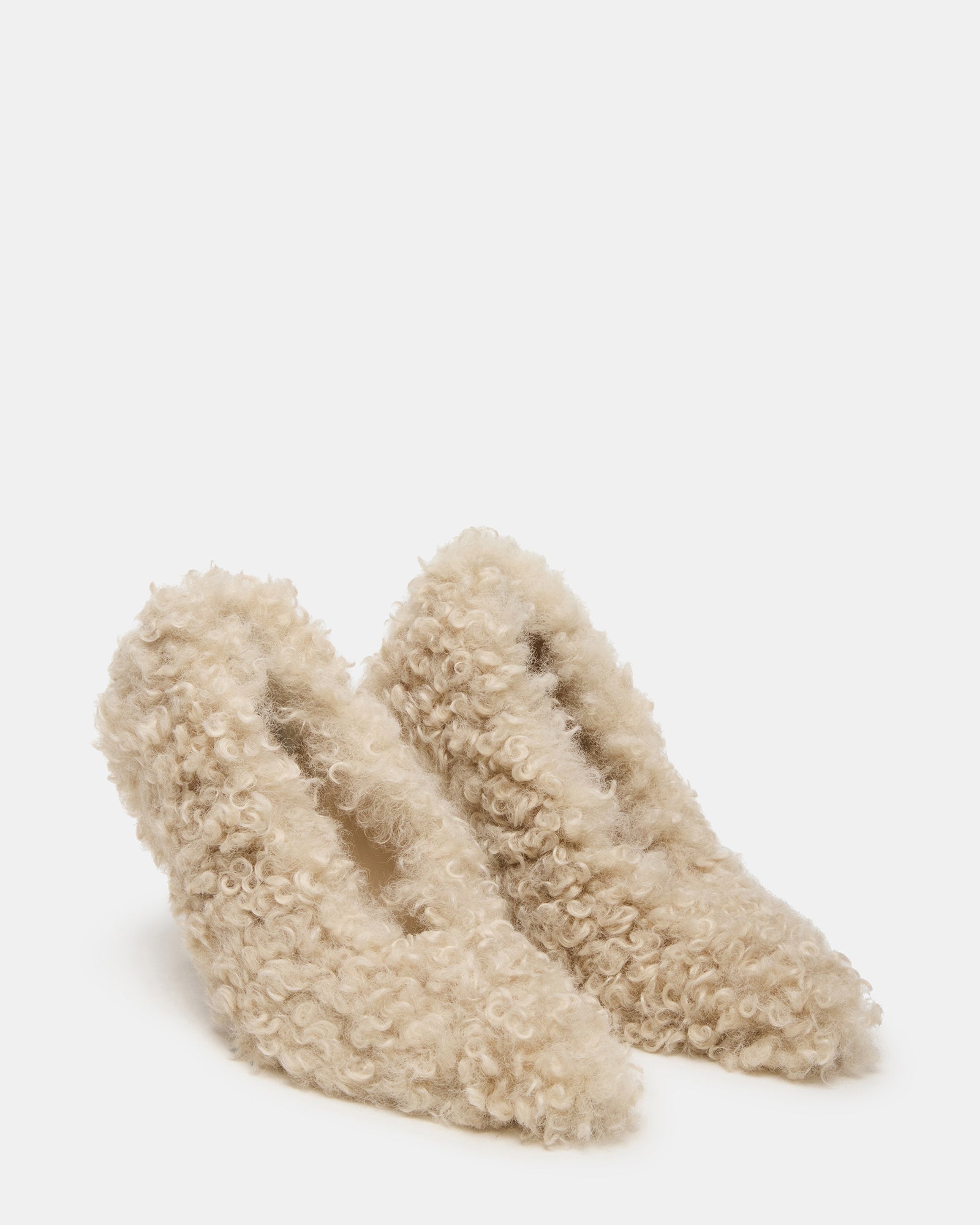 Top angle showcasing fluffy faux fur shoes and sleek silhouette