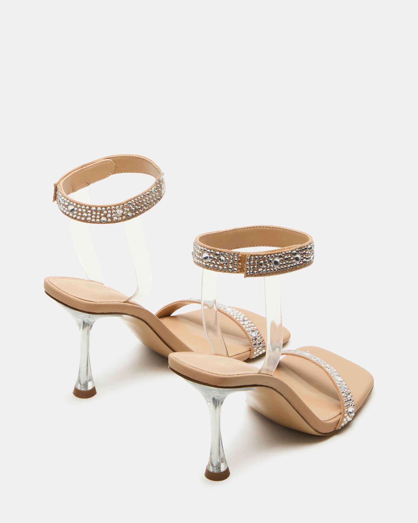 Gold rhinestone heels shown from side angle, highlighting ankle strap comfort