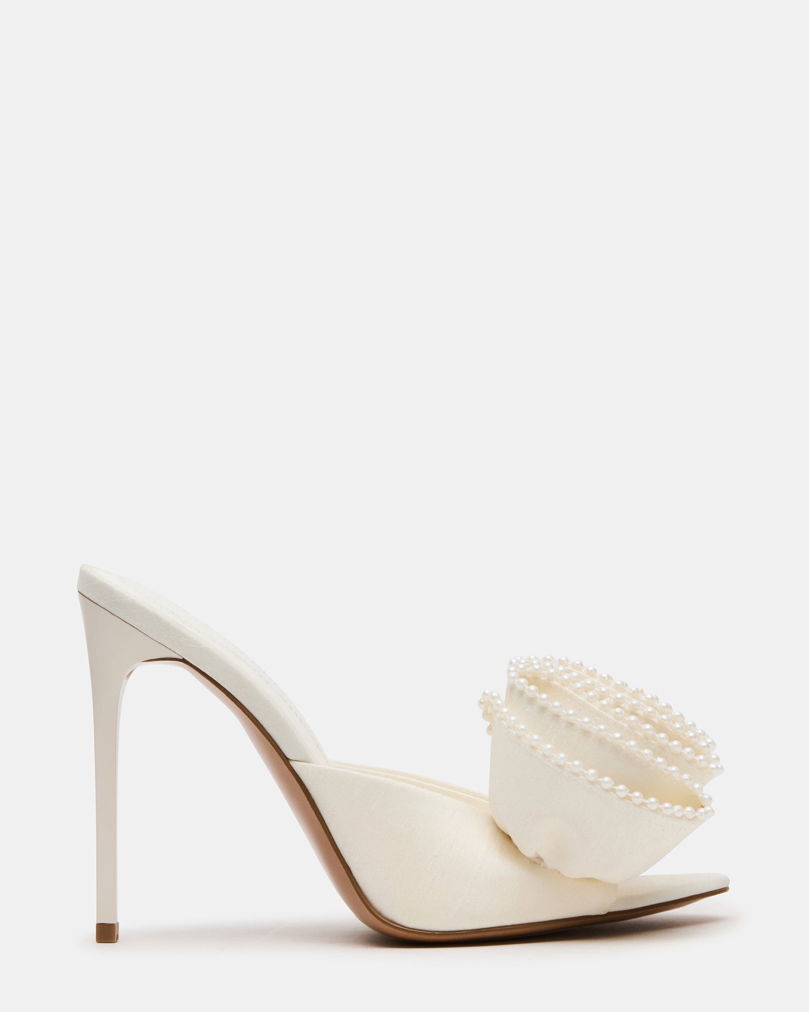 Side angle of ivory satin mule shoe with stiletto heel