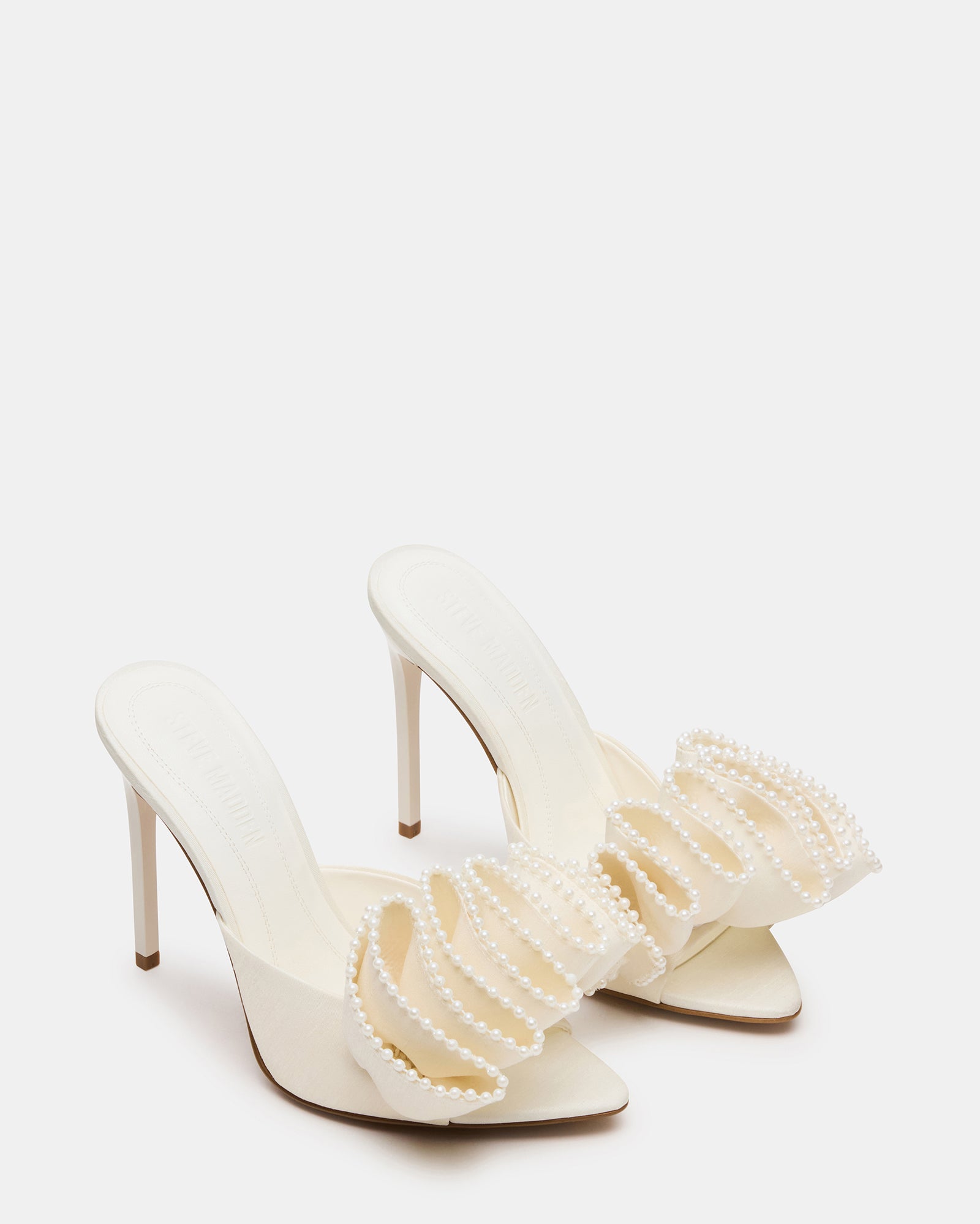 Top view showing ruffle detail and pointed toe mule design