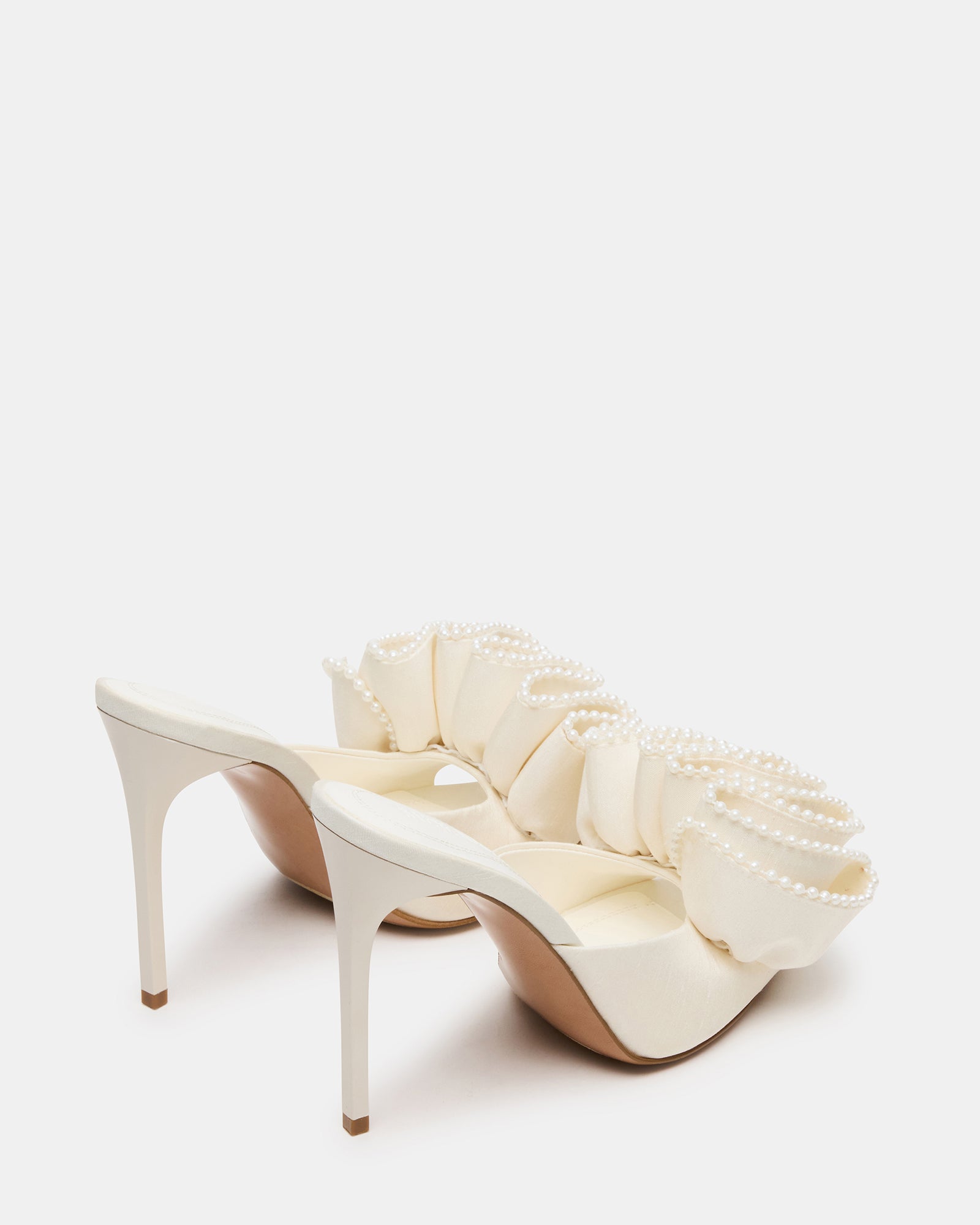 Top view showing ruffle detail and pointed toe mule design