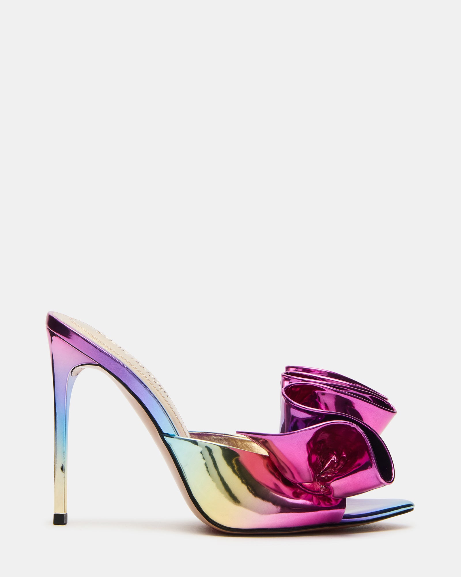Close-up of Affinity metallic mule heels highlighting the sleek design.