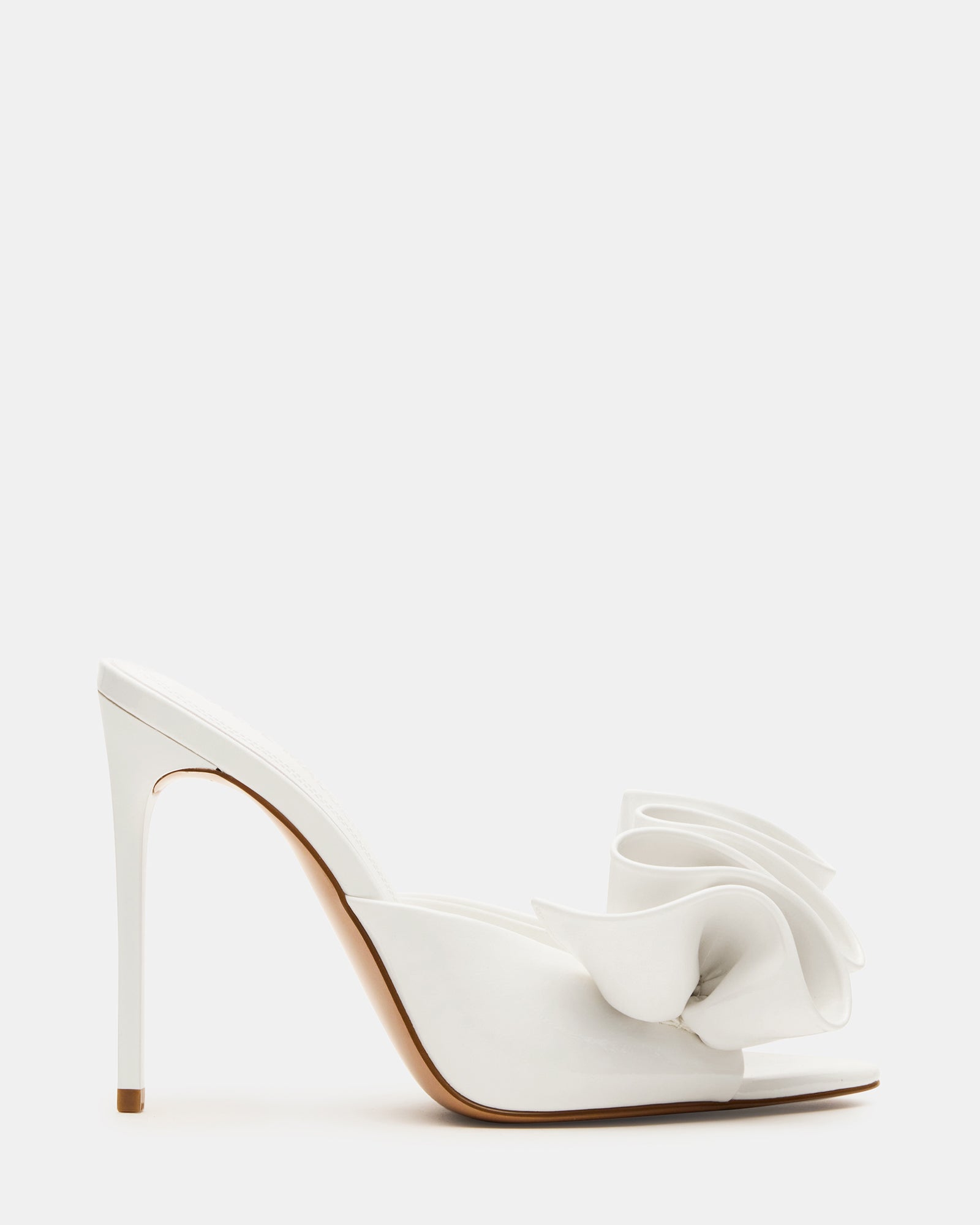 Elegant white patent stiletto heels with pointed toe design.