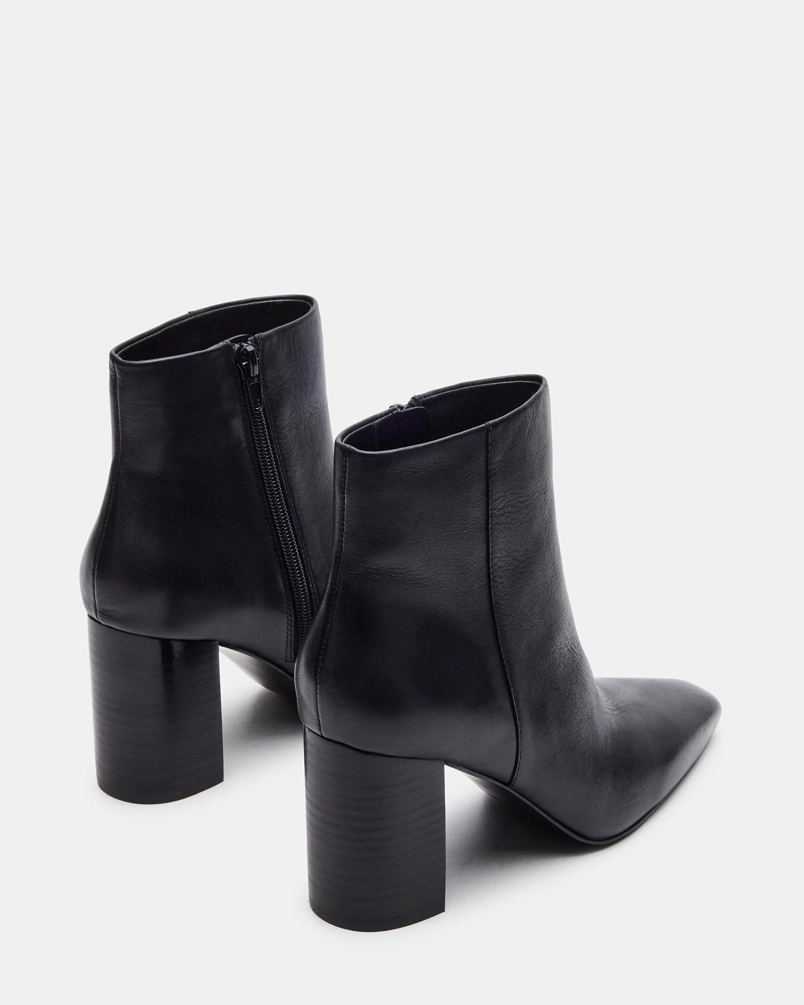Close-up of the leather upper of Aidan black ankle boots highlighting the quality craftsmanship.