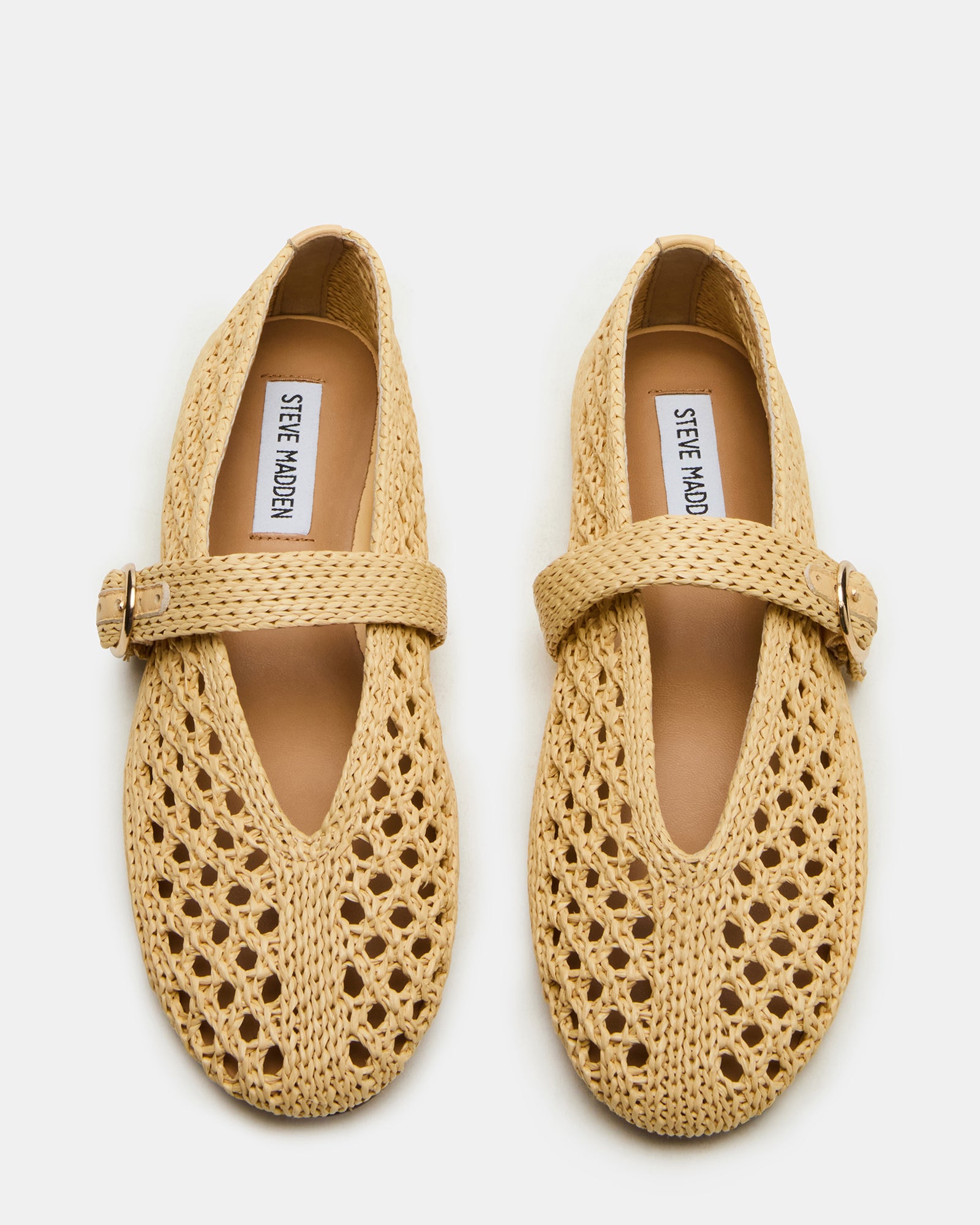 Black Mary Jane flats with adjustable strap, ideal for casual outings.