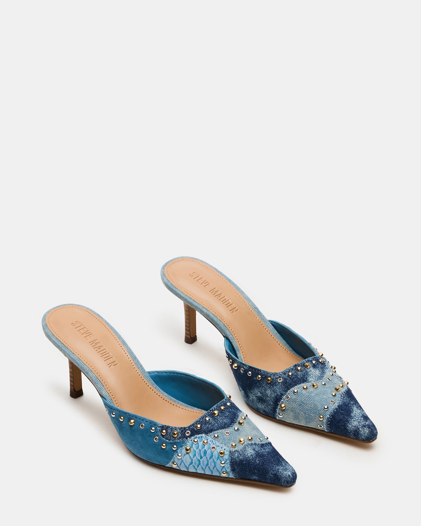 Side angle of black dress shoes styled for urban wear