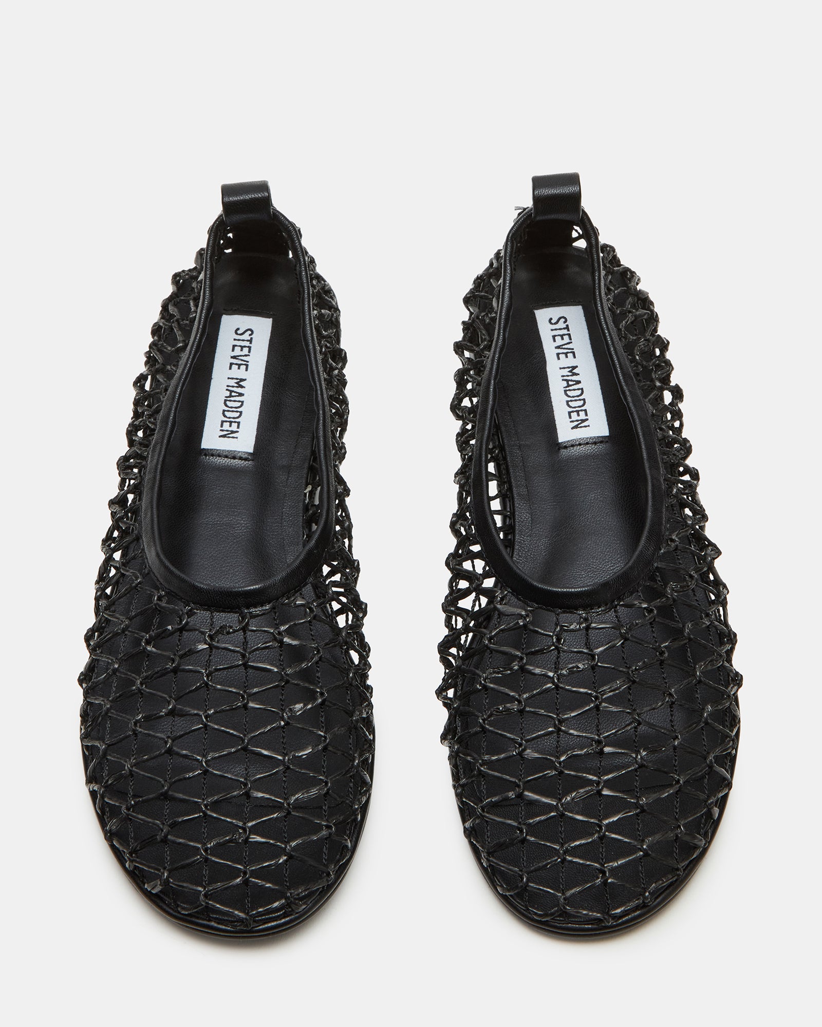 Side view of AMBROSIA black ballet flats showing the rounded toe and net cage detail