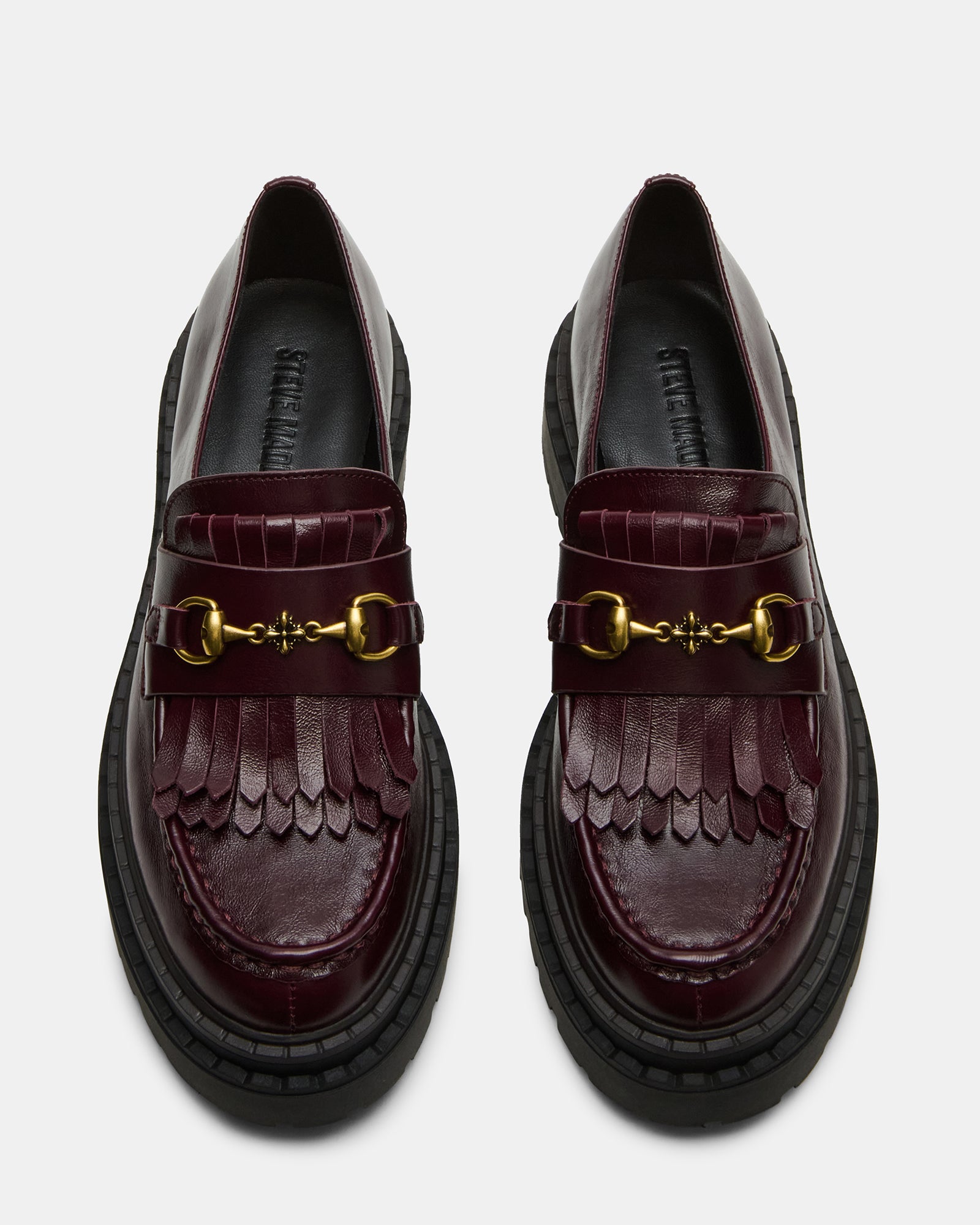 Side view of the ANABETH burgundy platform loafer with horsebit hardware