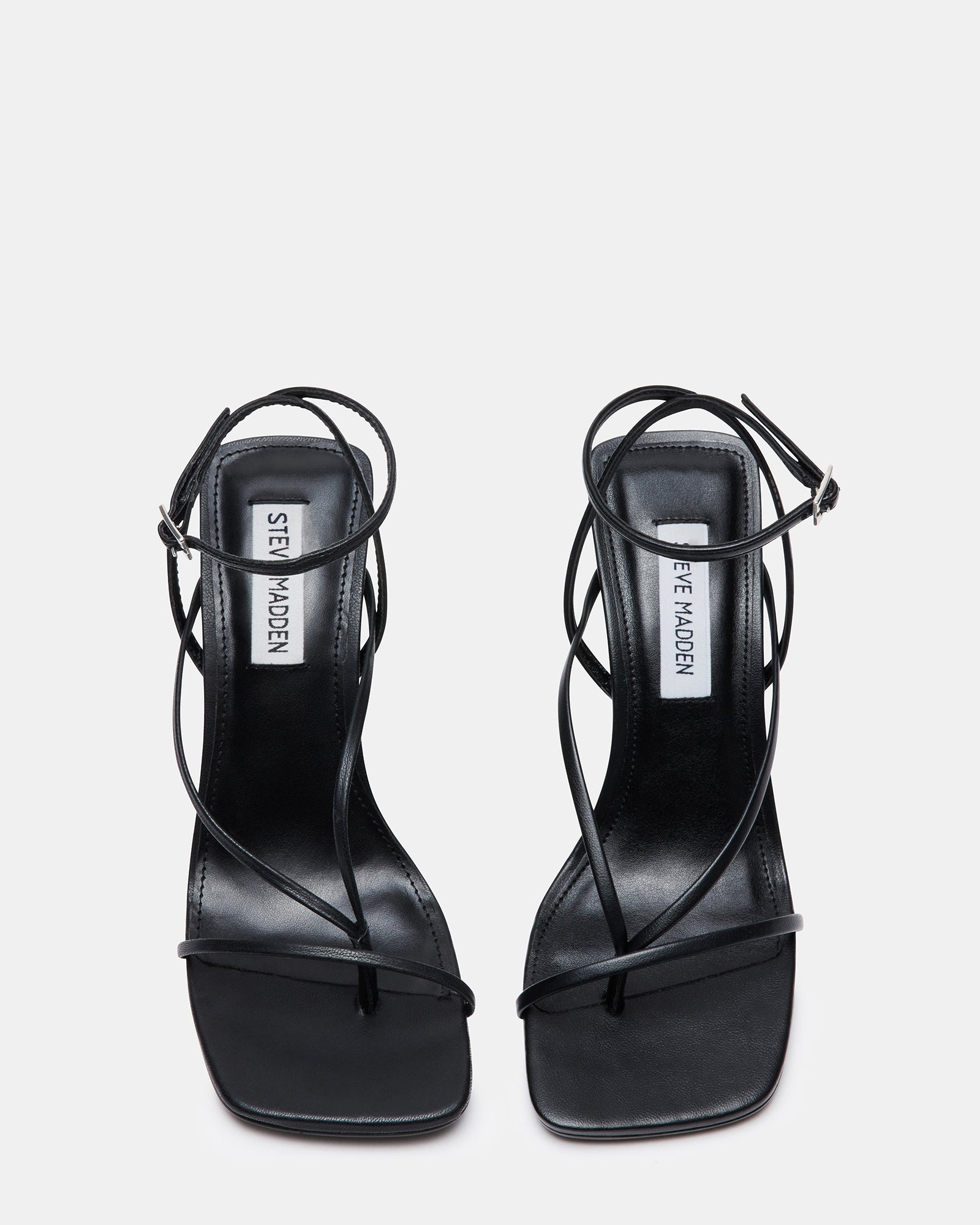 Annie black stiletto heels styled with fitted blazer and trousers