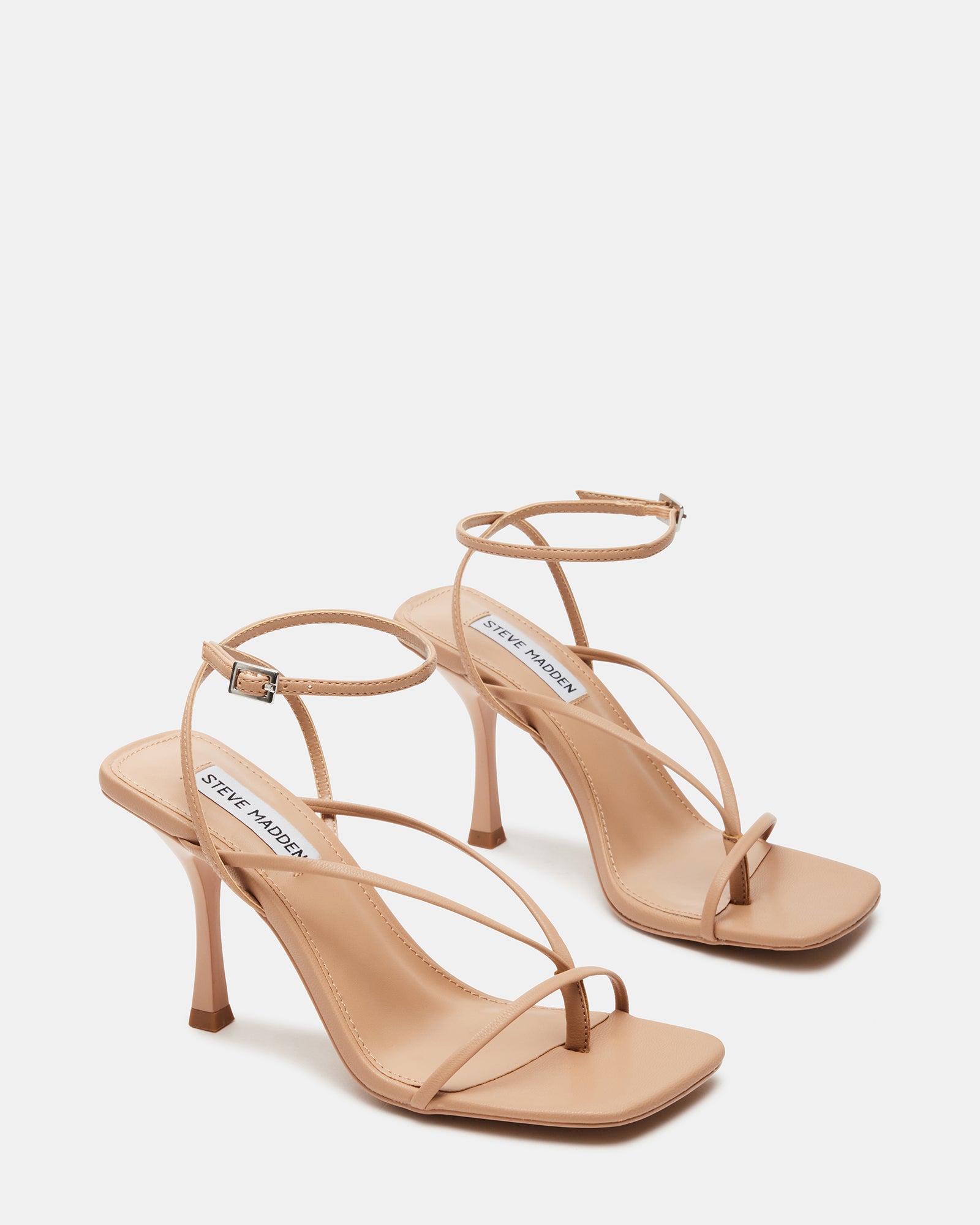 Close-up of vegan leather upper of Annie strappy stiletto heels.