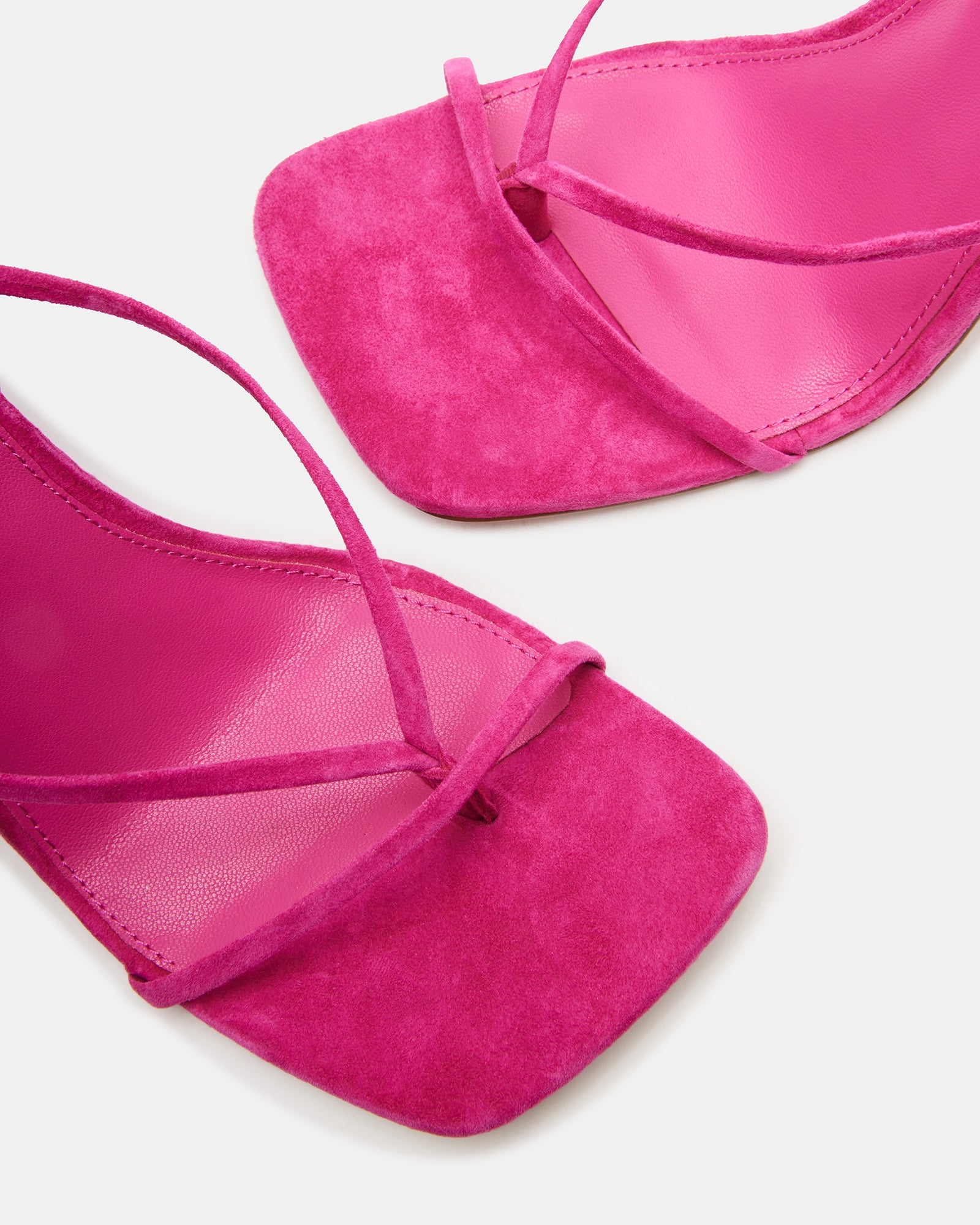Close-up of womens arch support dress shoes in pink suede.