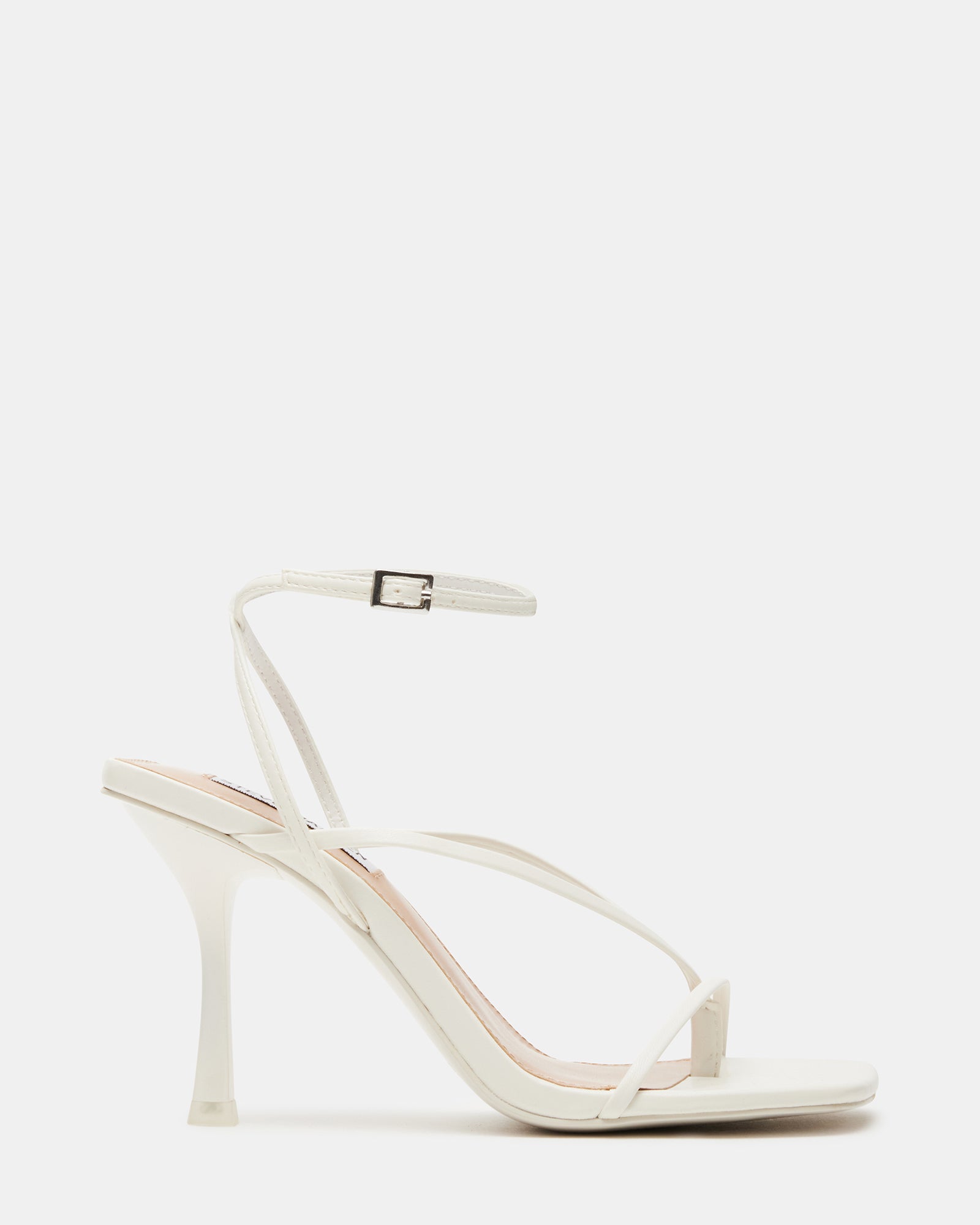 Side view of Annie white stiletto heels showcasing strappy design.