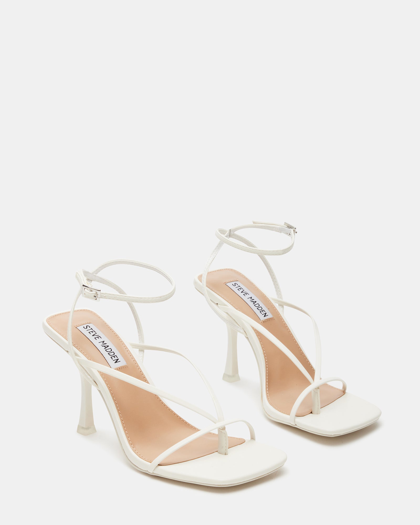 Close-up of vegan leather upper on Annie white stiletto heels.